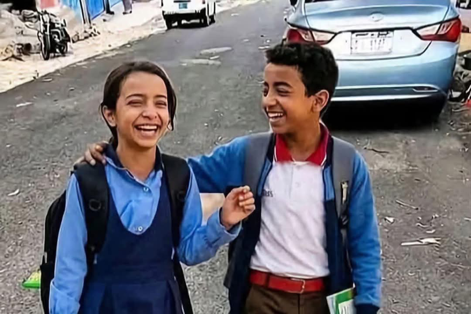 Boy walks with girl