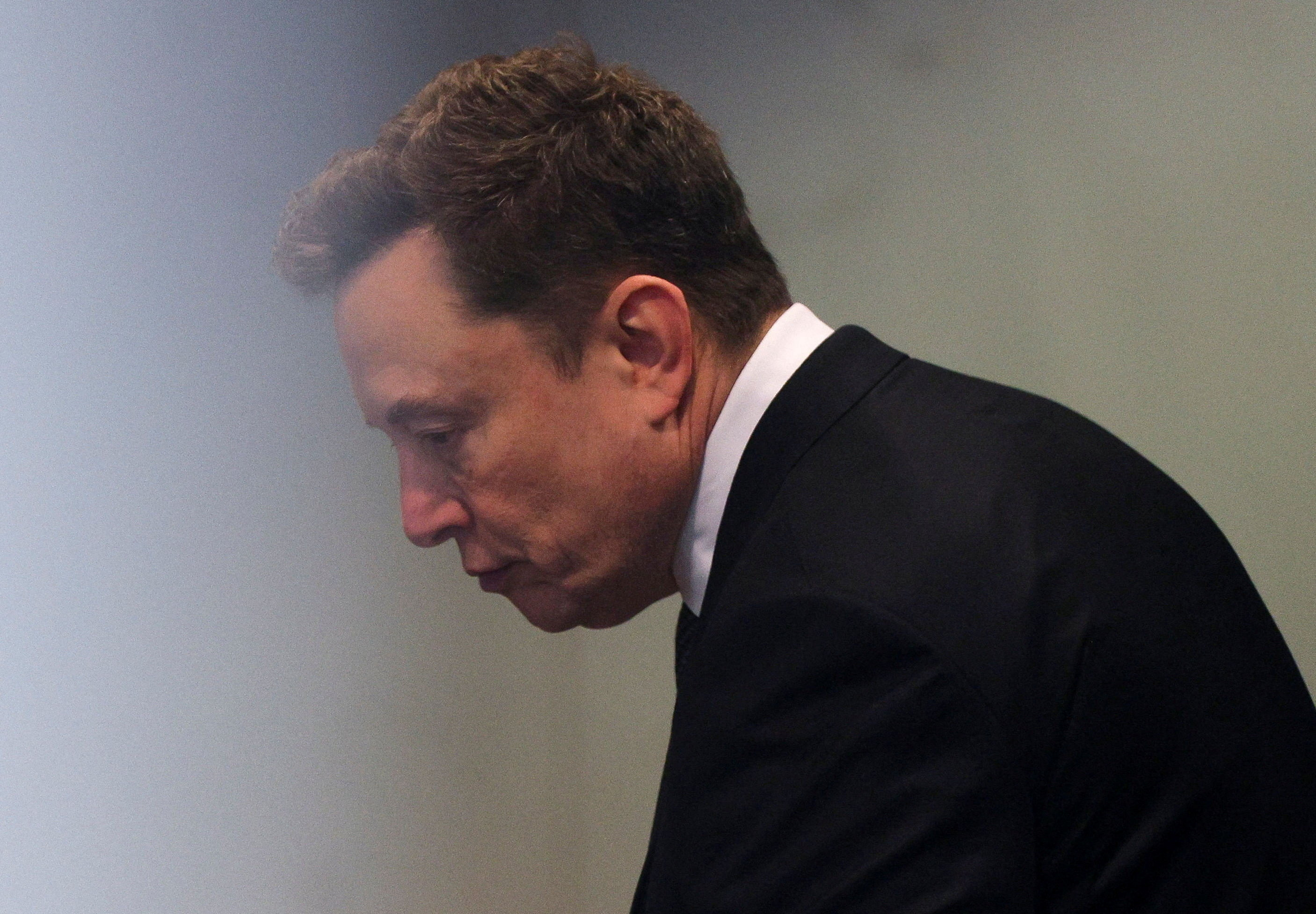 Elon Musk appears in the courthouse to attend the trial in his lawsuit over OpenAI for-profit conversion at a federal courthouse, in Oakland, California, U.S., April 29, 2026. REUTERS/Manuel Orbegozo