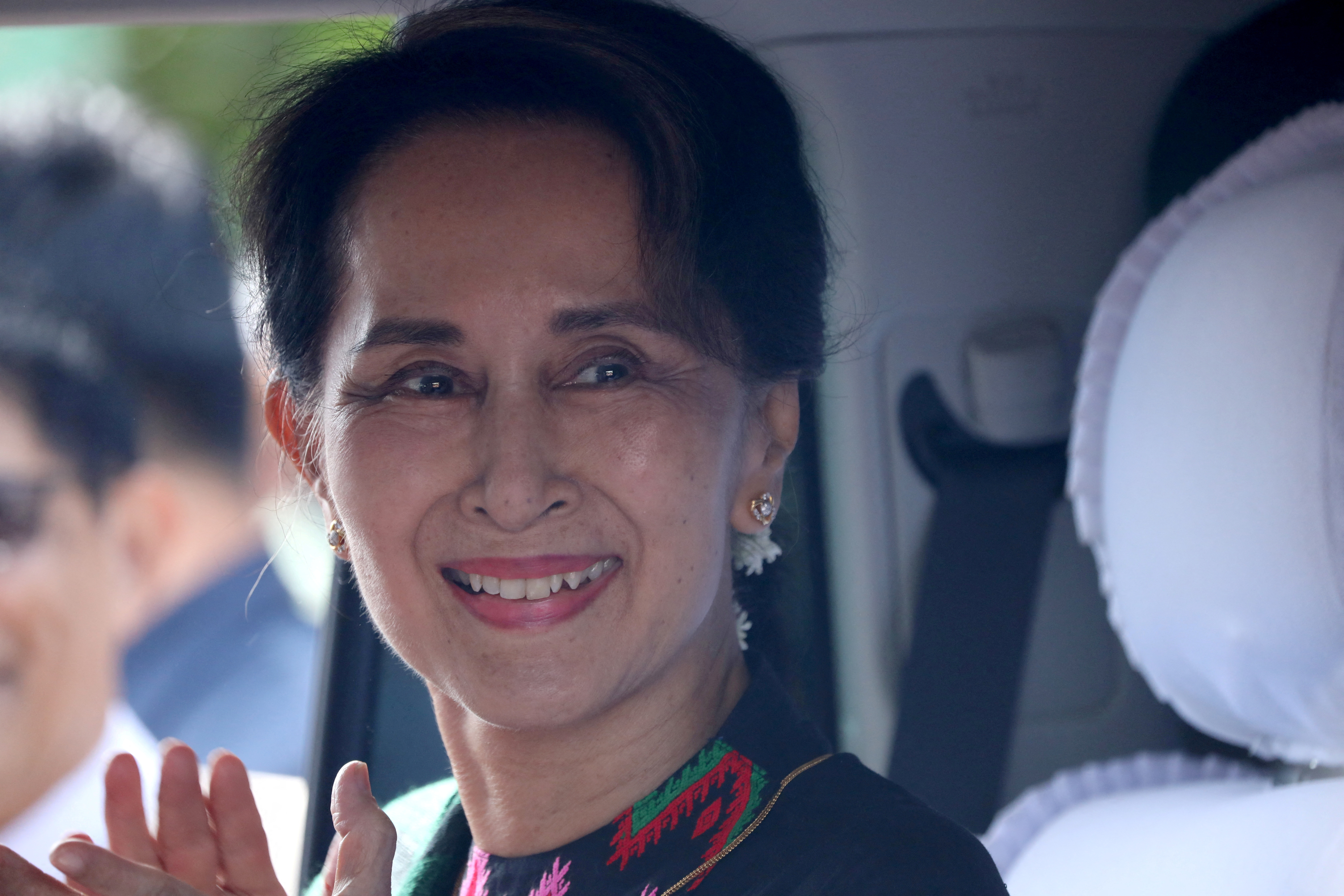 FILE PHOTO: FILE PHOTO: Myanmar's State Counsellor Aung San Suu Kyi arrives at a school in Kawhmu, Yangon, Myanmar, July 18, 2019. REUTERS/Ann Wang/Files/File Photo
