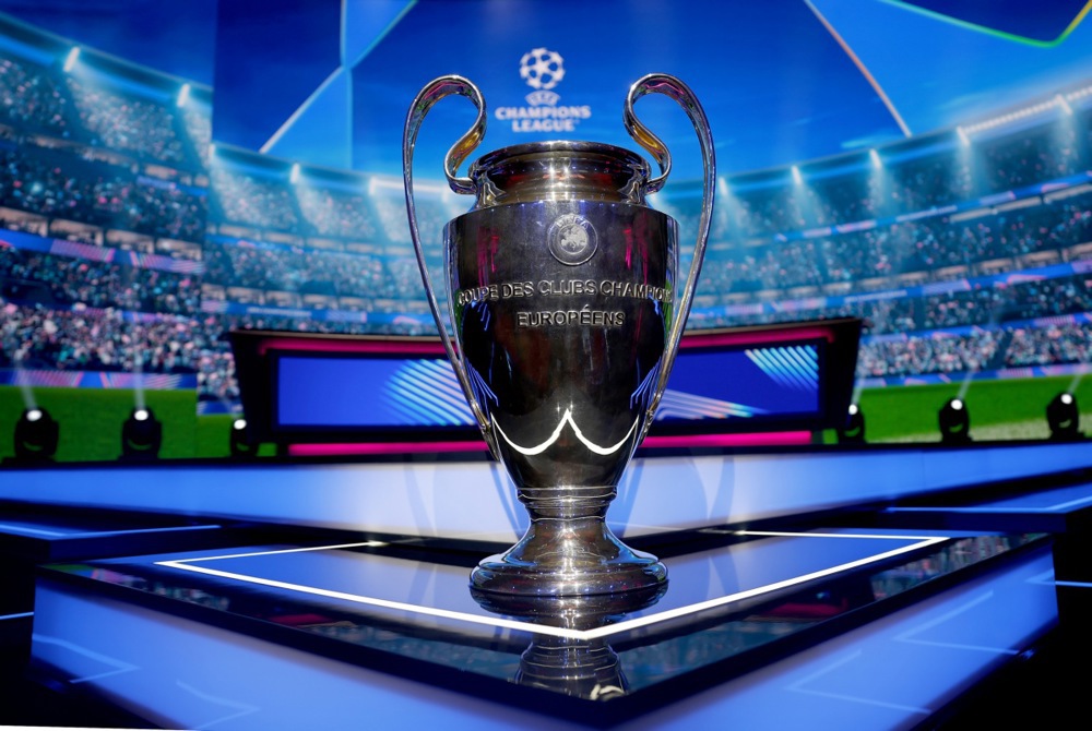 The UEFA Champions League trophy on display before the UEFA Champions League league phase draw at the Grimaldi Forum in Monaco