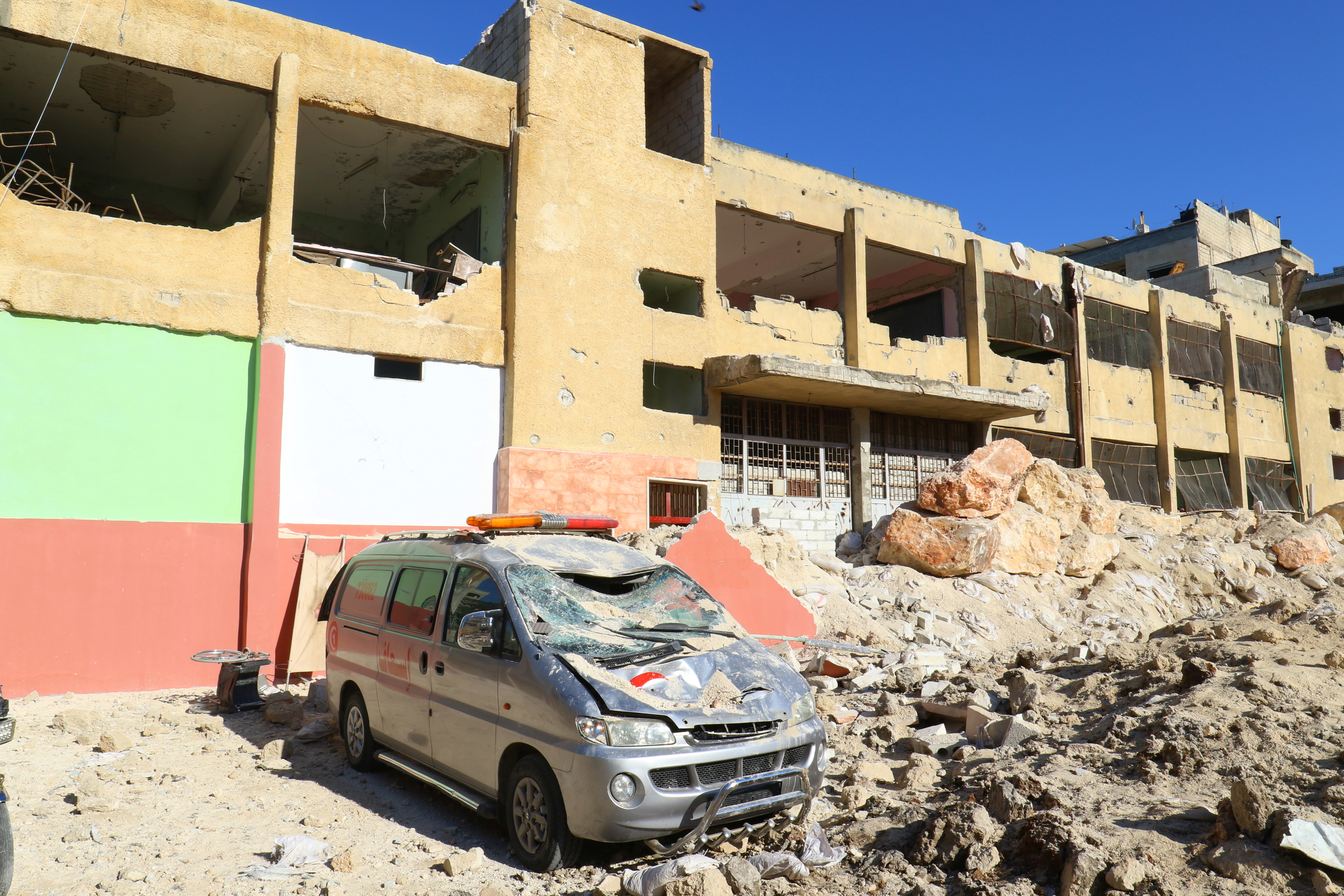 Damaged ambulance and hospital in Kafr Takharim, Syria