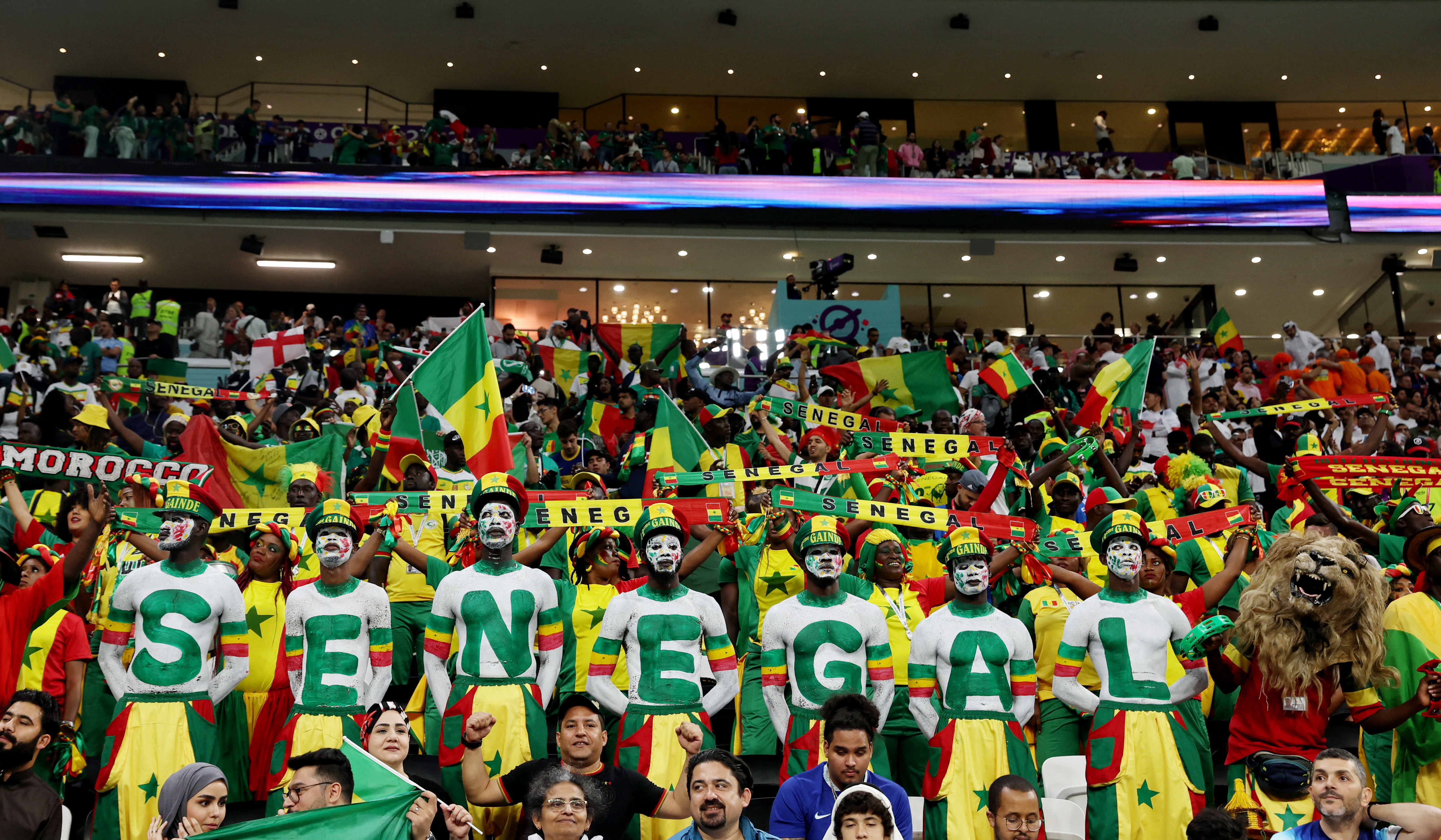 Senegal fans cheer before the FIFA World Cup Round of 16 match against England at Al Bayt Stadium in Qatar, December 2022