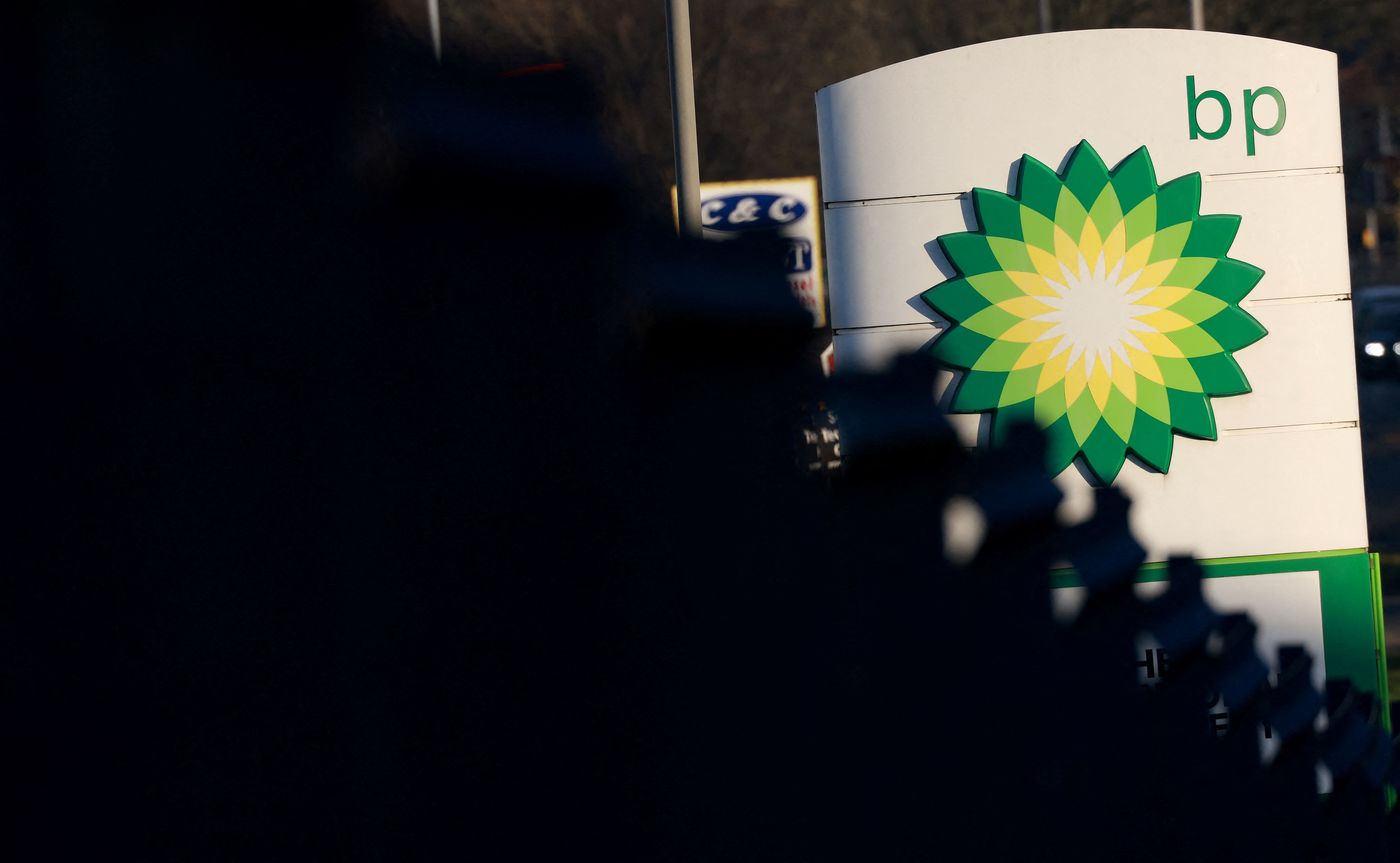 Signage is seen outside a BP (British Petroleum) petrol station in Liverpool, Britain, February 7, 2023. REUTERS/Phil Noble