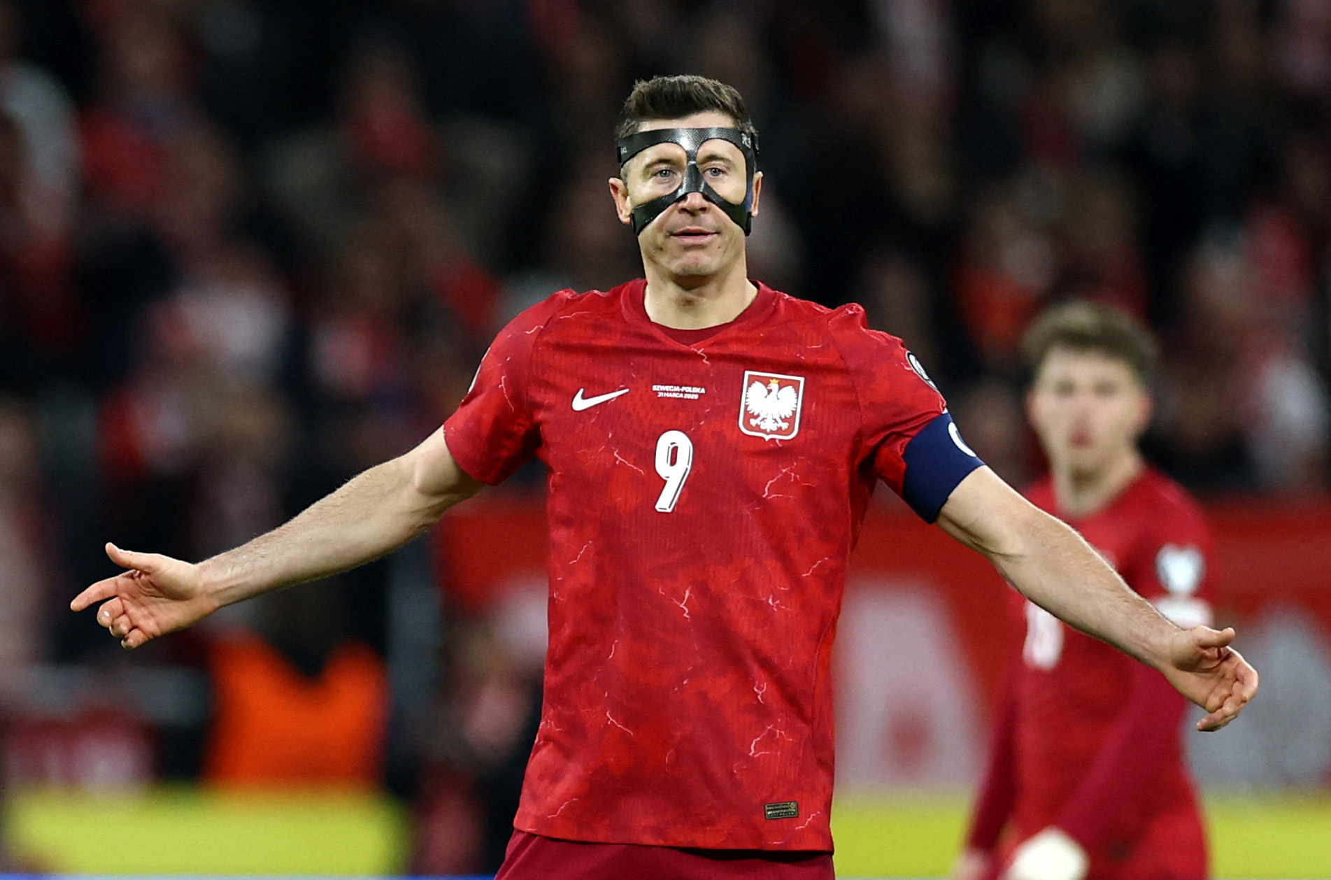 Soccer Football - FIFA World Cup - UEFA Qualifiers - Finals - Sweden v Poland - Strawberry Arena, Solna, Sweden - March 31, 2026 Poland's Robert Lewandowski reacts during the match REUTERS/Kacper Pempel