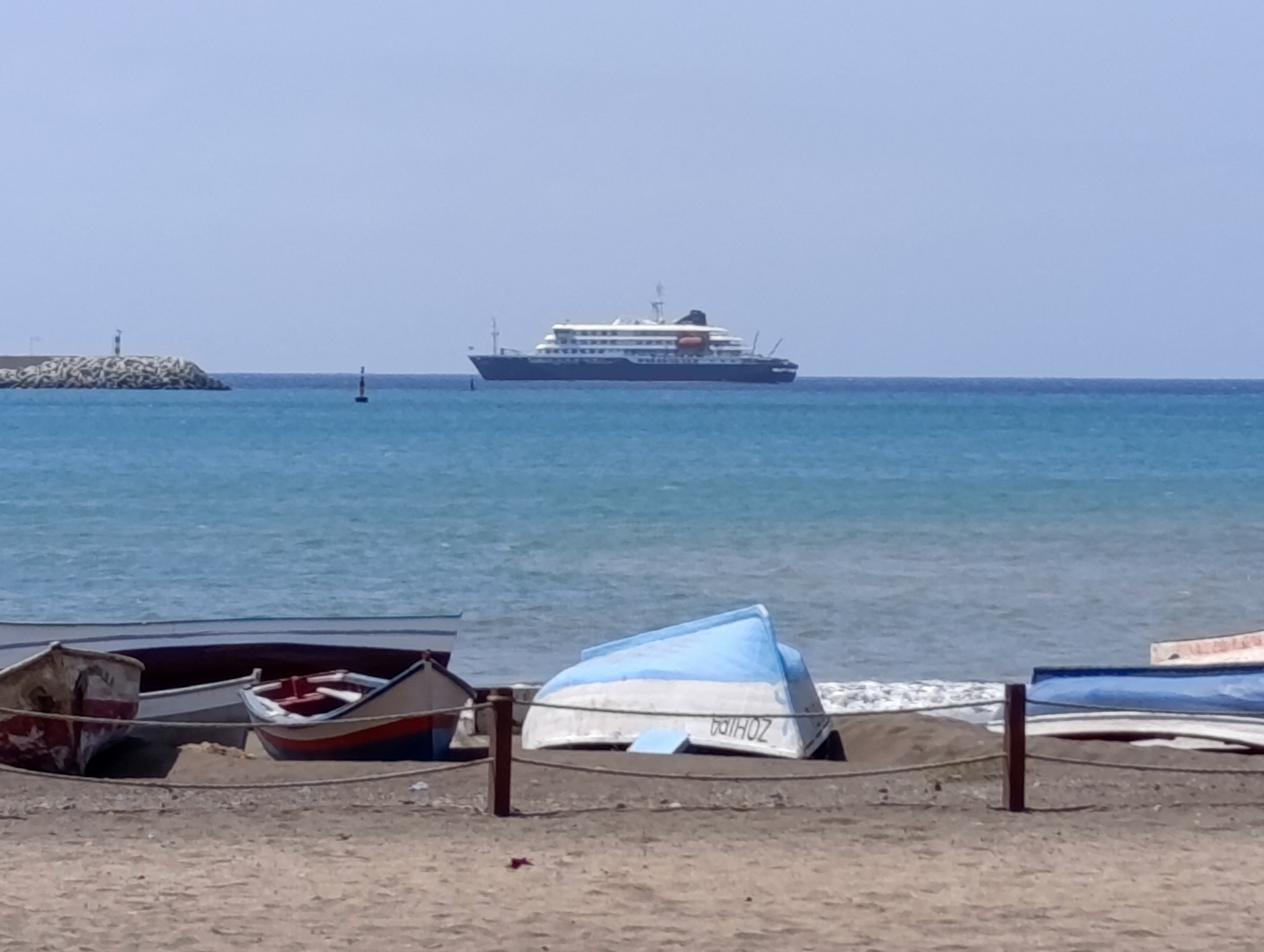 A ship docked at a port.