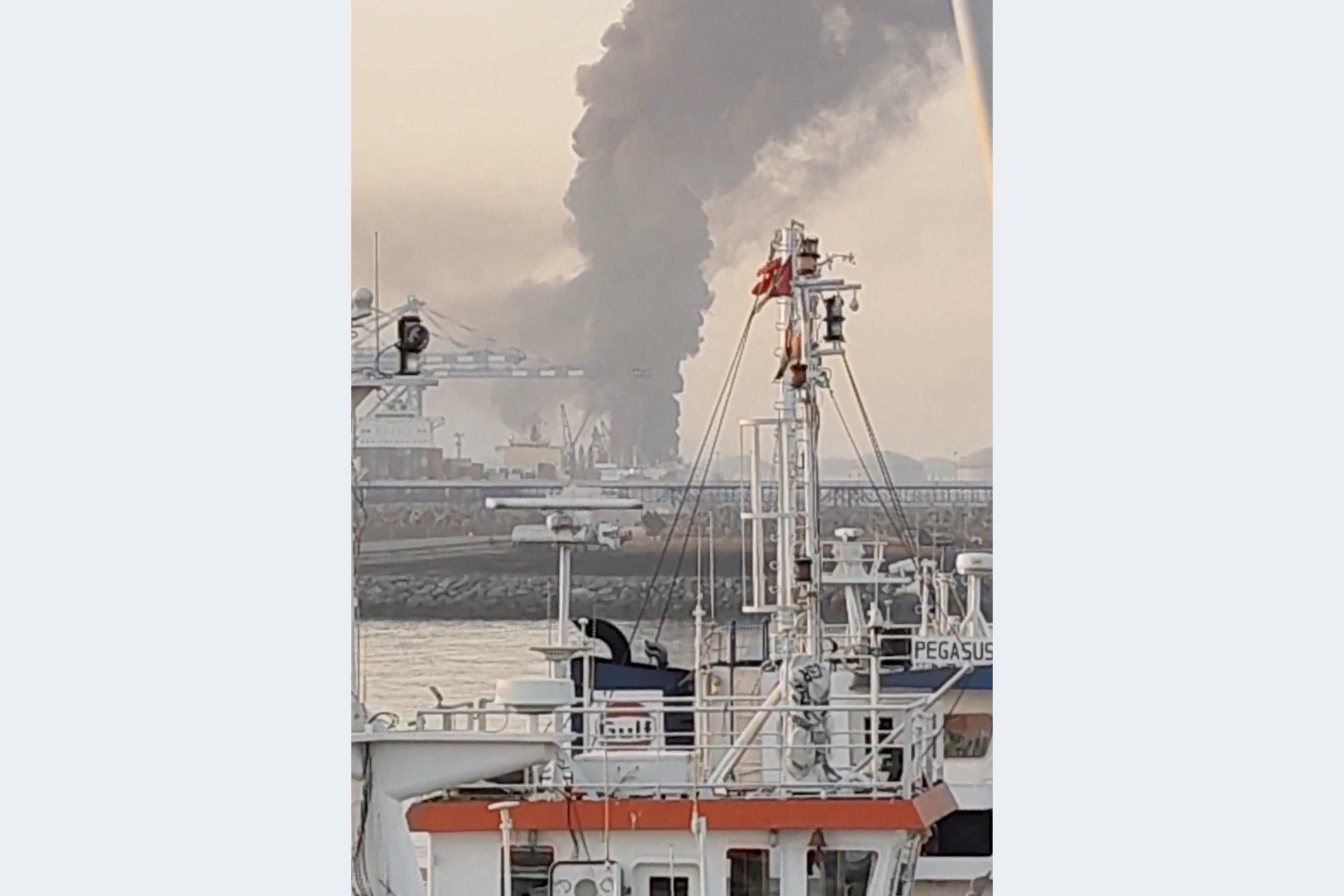 Smoke billows from Fujairah oil industry zone, following a drone attack, in Fujairah