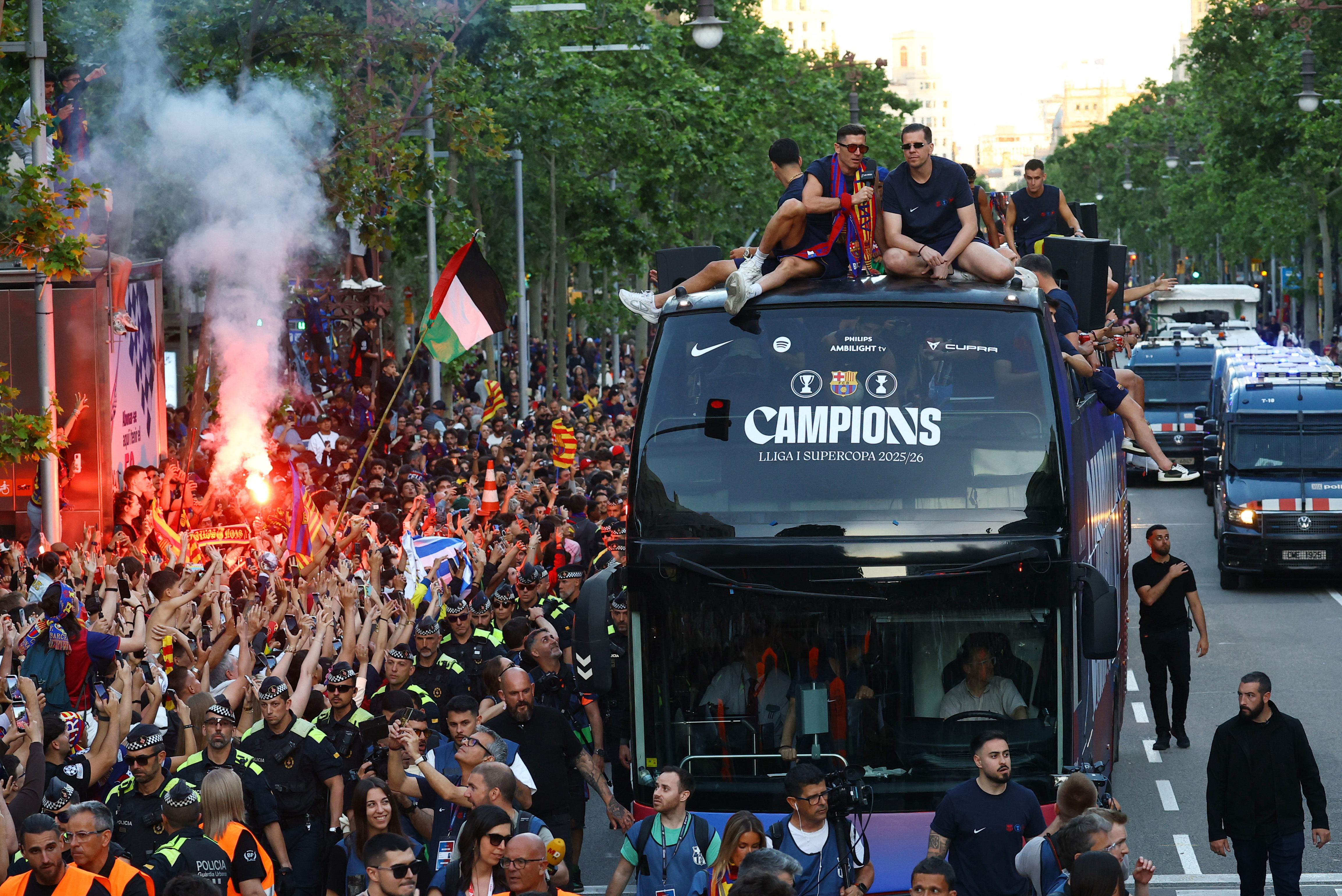 Barcelona players on the bus parade as they celebrate winning LaLiga