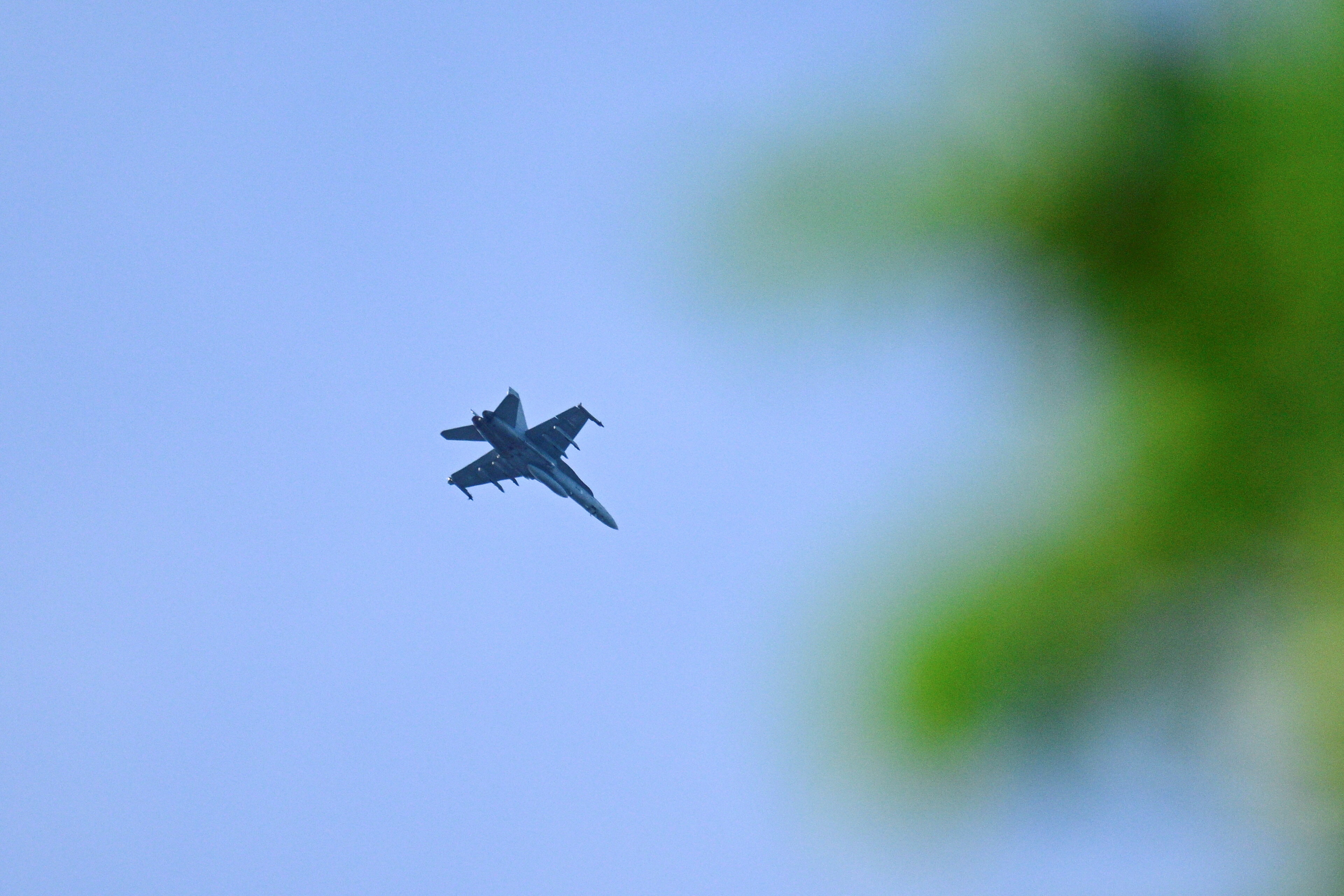 A fighter plane in the sky.