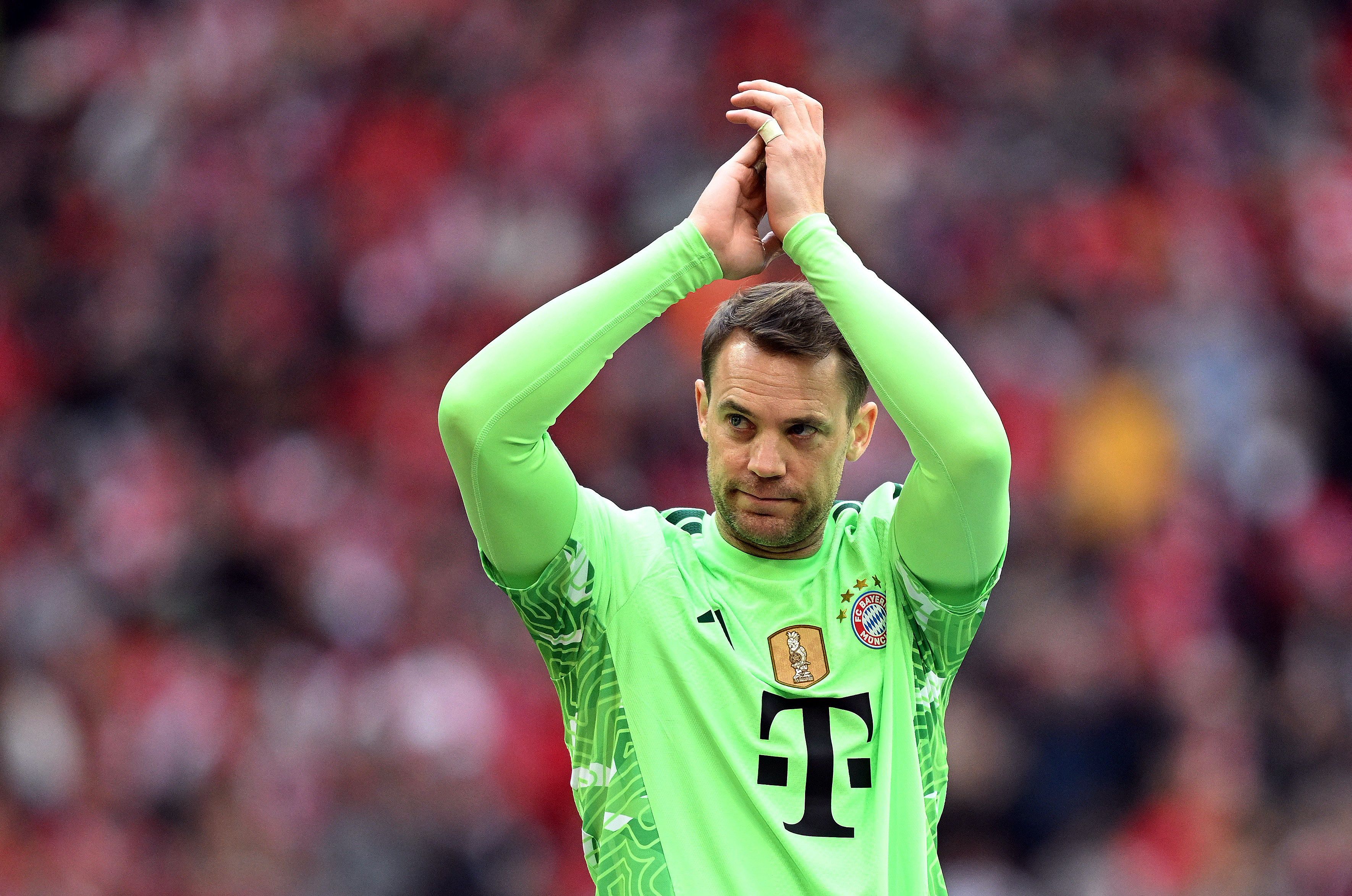 Bayern Munich's Manuel Neuer celebrates after winning the Bundesliga