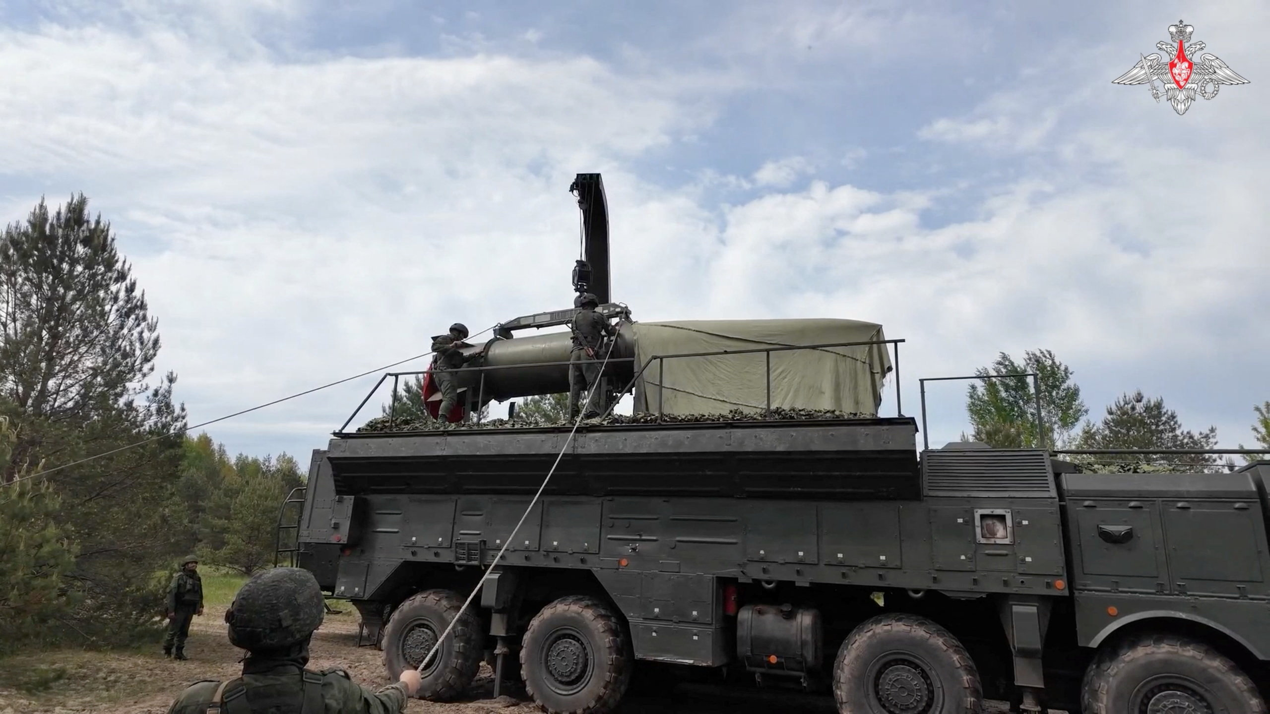 Service members mount a missile on a Russian Iskander-M missile launcher during nuclear forces exercises at an unidentified location in Belarus, in this still image taken from handout footage released on May 21, 2026. Russian Defence Ministry/Handout via REUTERS ATTENTION EDITORS - THIS IMAGE WAS PROVIDED BY A THIRD PARTY. NO RESALES. NO ARCHIVES. MANDATORY CREDIT. WATERMARK FROM SOURCE.