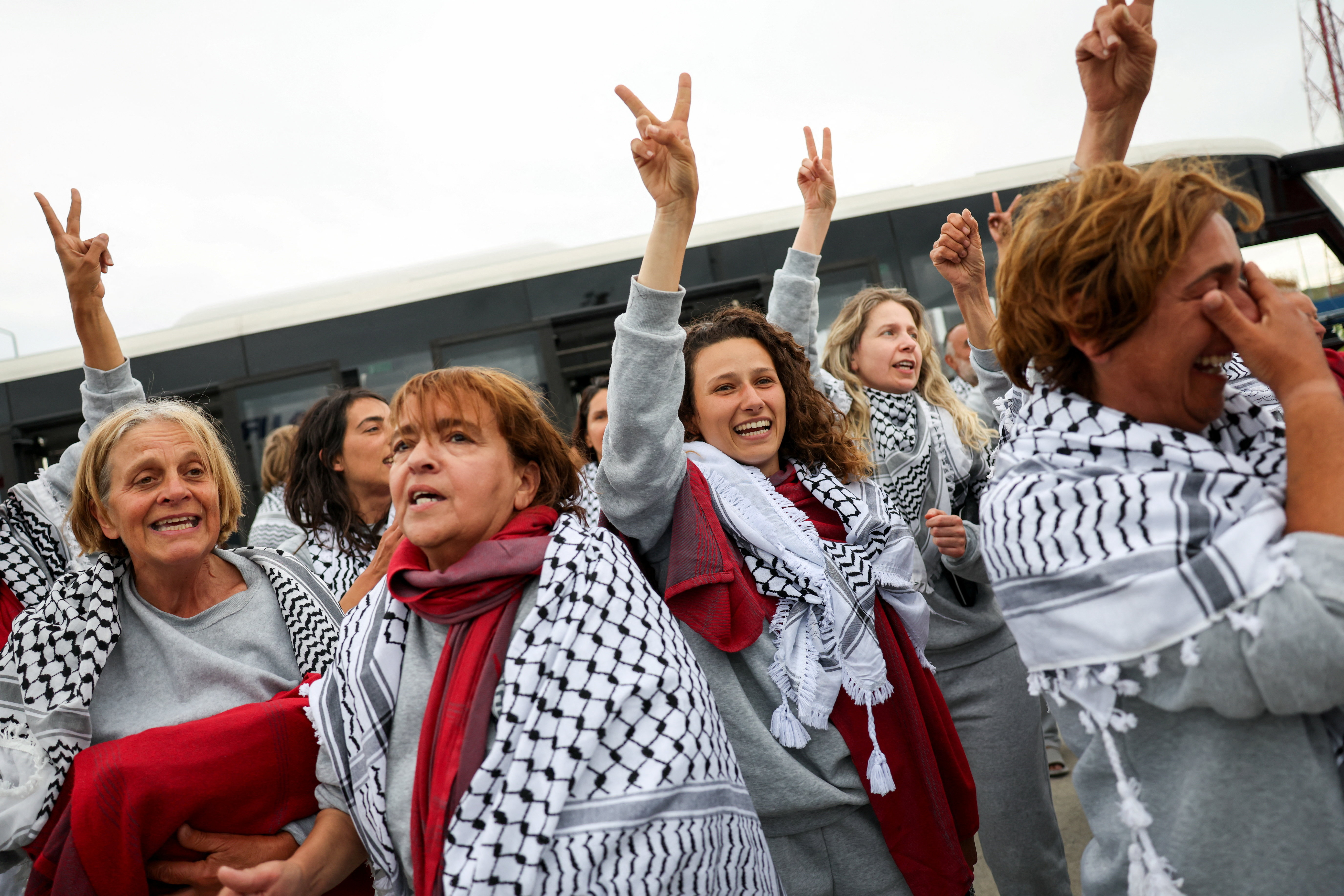 Activists from the Gaza-bound Global Sumud Flotilla, detained by Israeli forces after their vessels were intercepted in international waters in the Mediterranean, celebrate upon arrival at Istanbul Airport, Turkey, May 21, 2026. REUTERS/Murad Sezer