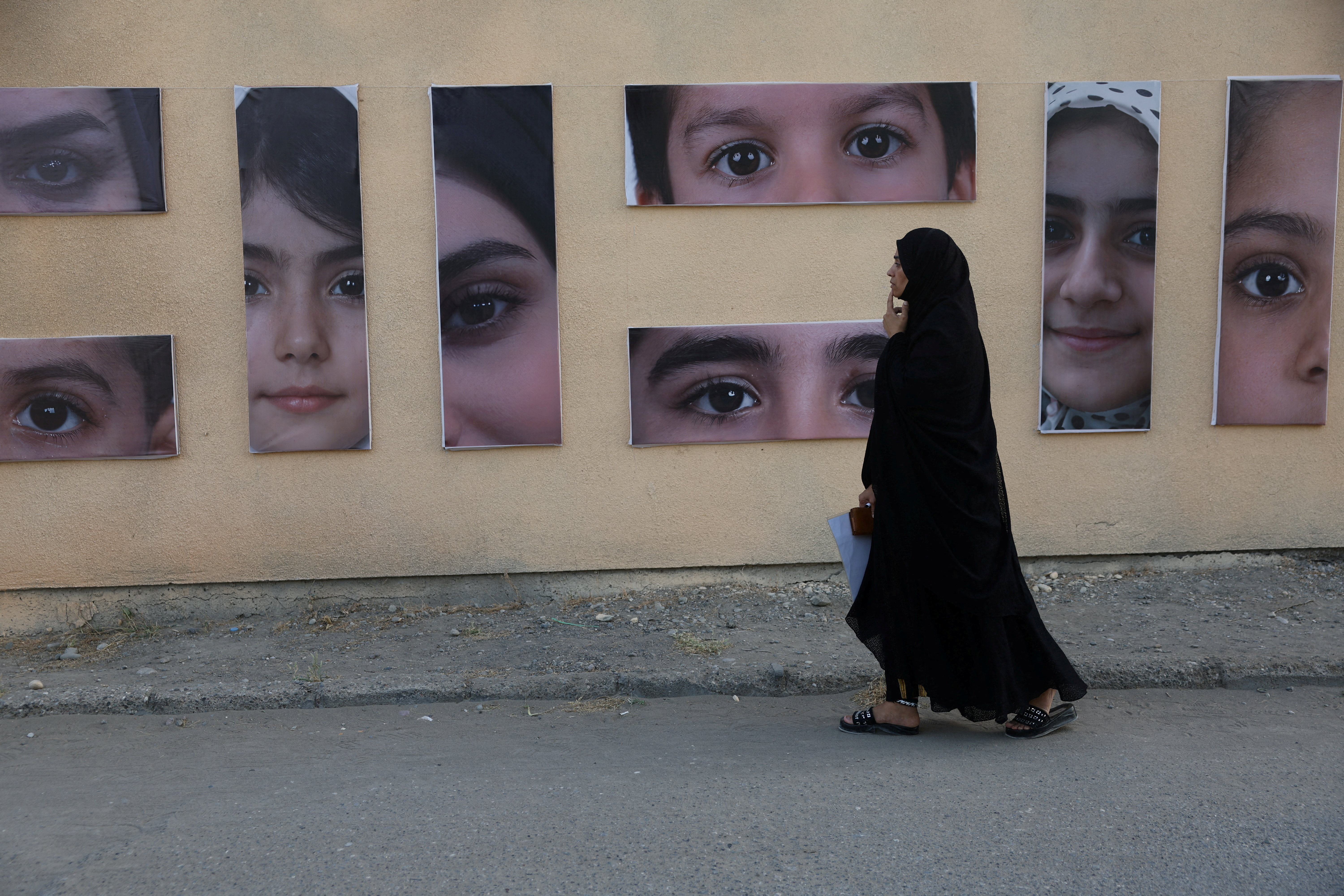 Raheleh, an Iranian woman who lost two of her children in Minab school strike