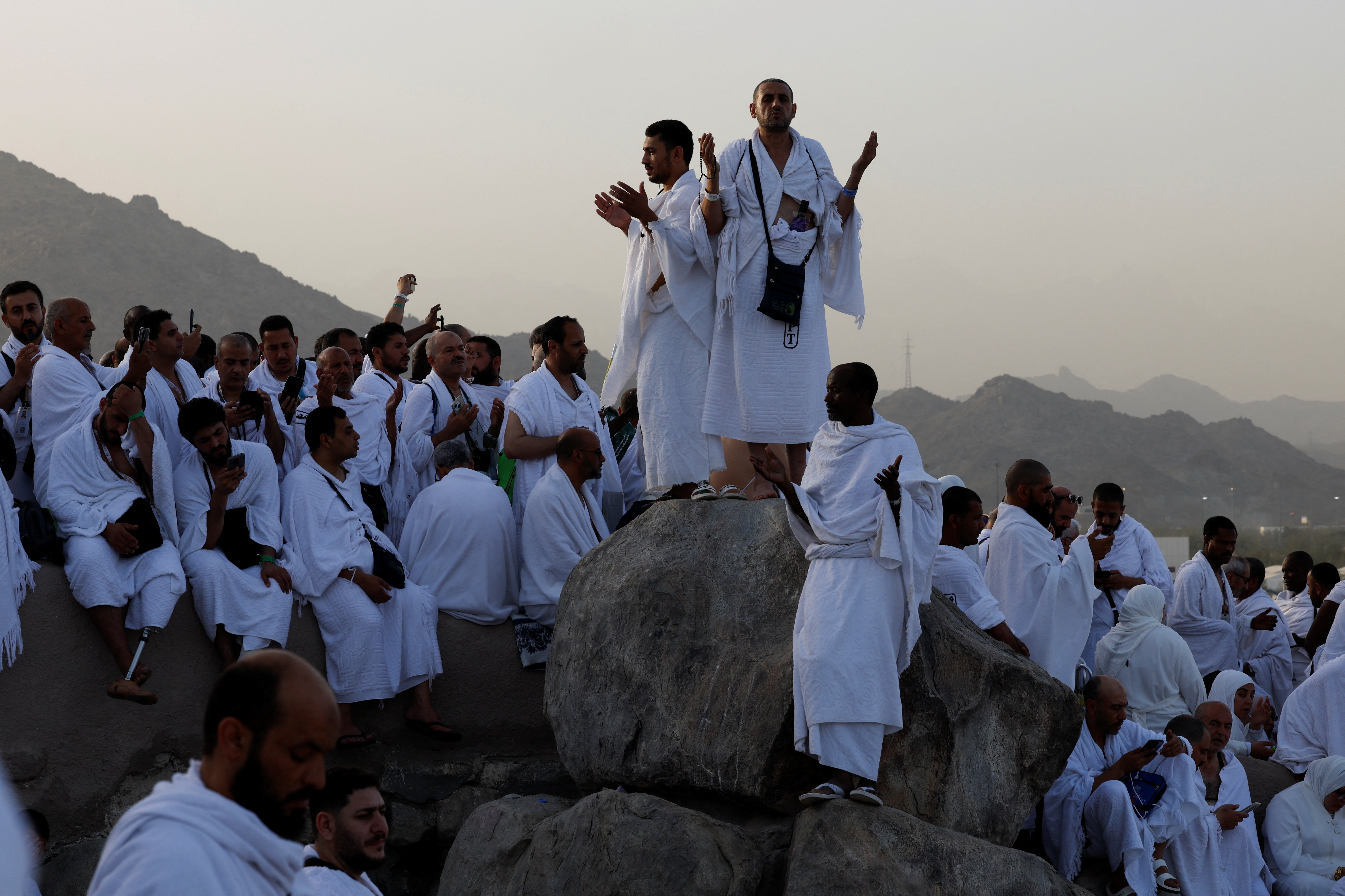 Muslim pilgrims gather at Mount of Mercy on the plain of Arafat