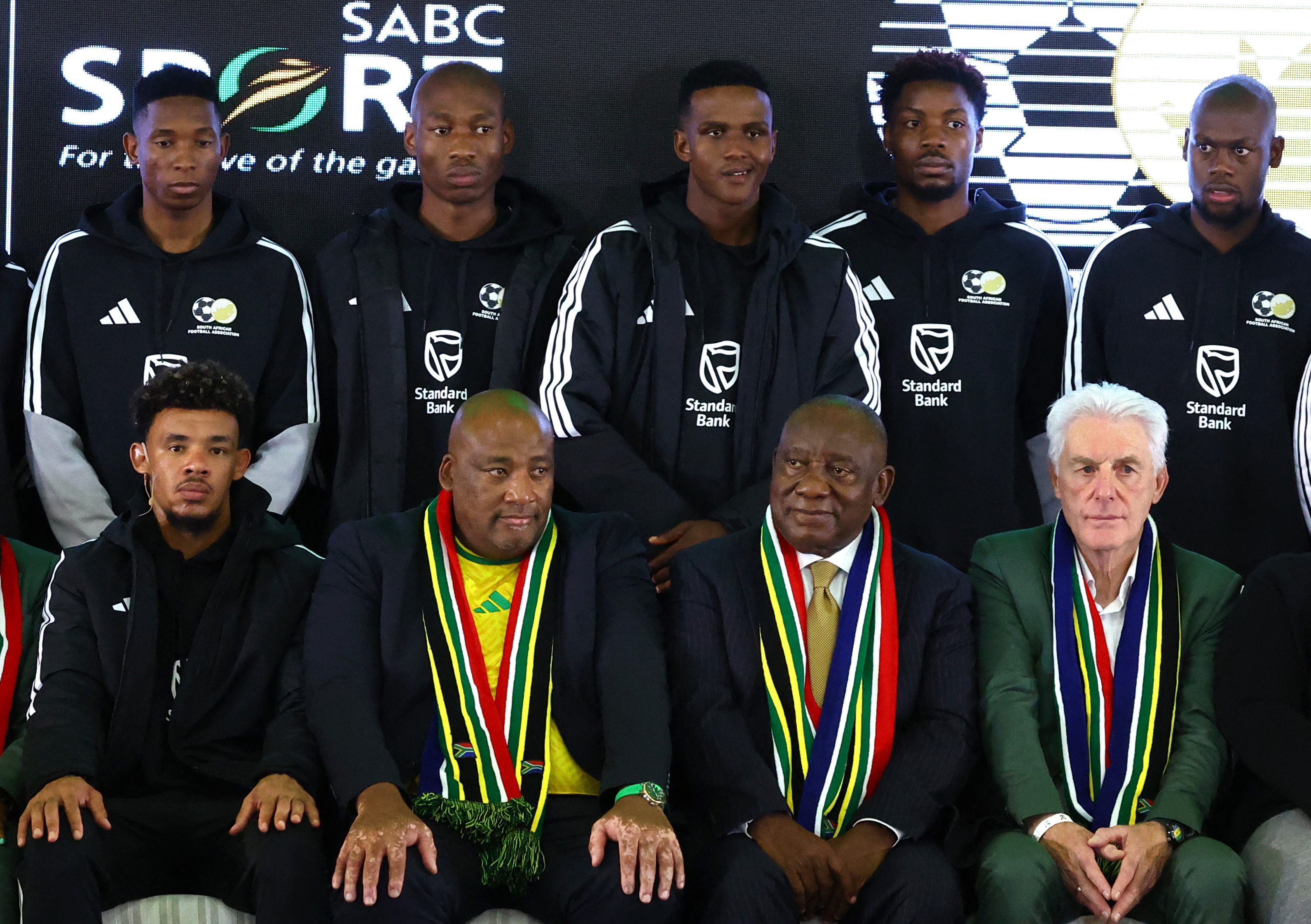 South Africa coach Hugo Broos, captain Ronen Williams and the rest of the World Cup squad pose for a photograph with President Cyril Ramaphosa and Sports Minister Gayton Mackenzie