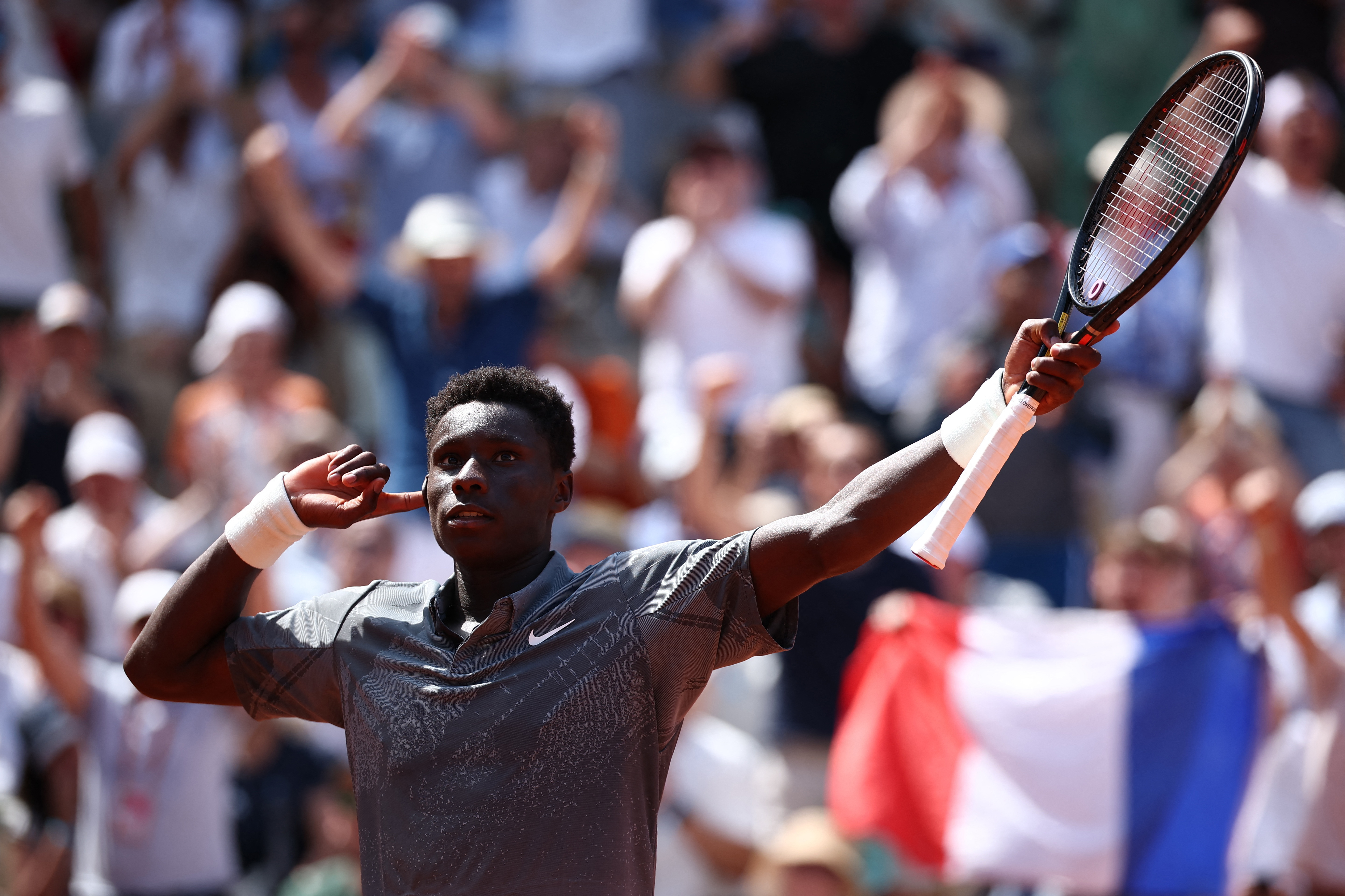 France's Moise Kouame reacts during his second round match against Paraguay's Adolfo Daniel Vallejo