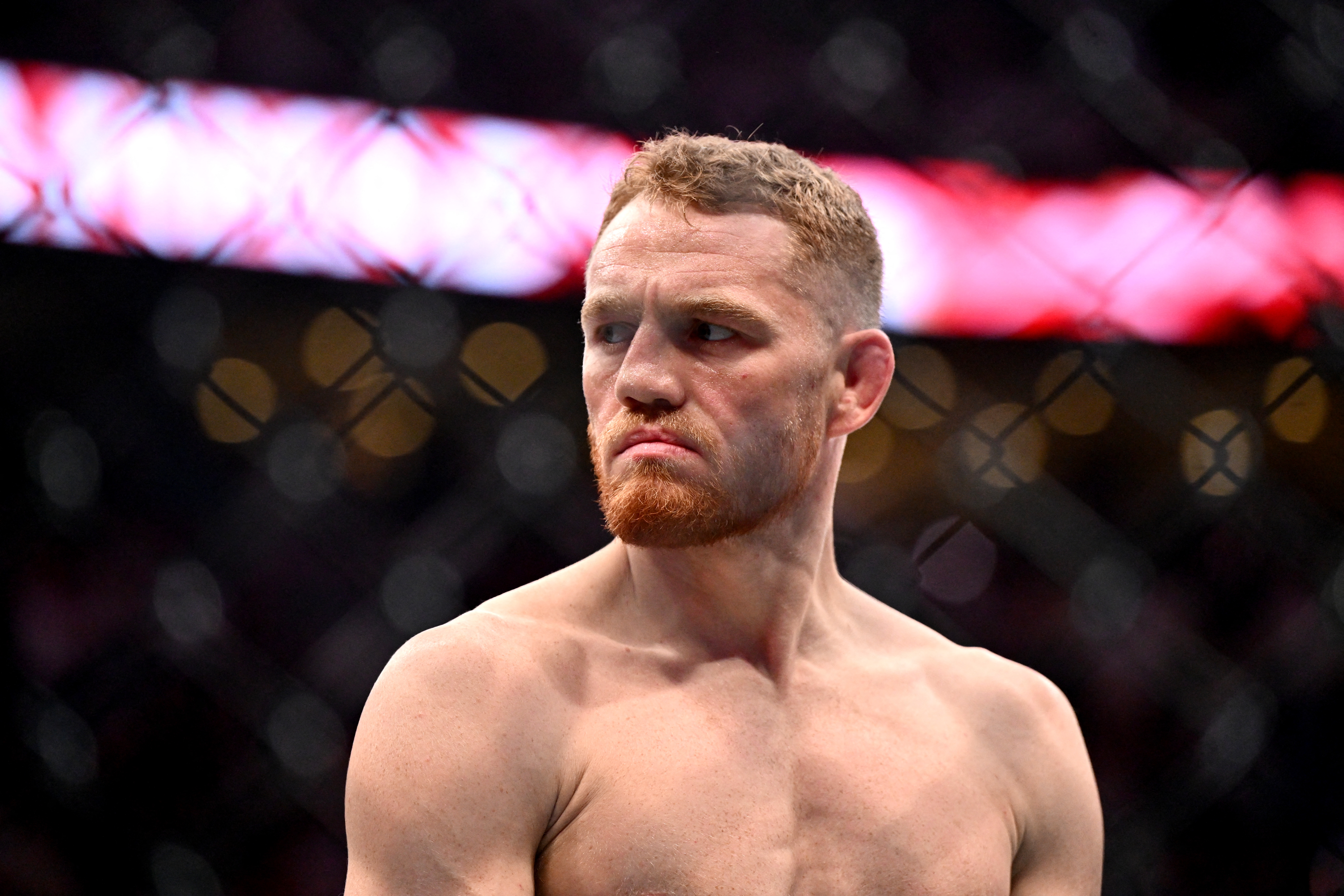 MONTREAL, QUEBEC - MAY 10: Jack Della Maddalena of Australia reacts as he enters the octagon prior to a welterweight title bout against Belal Muhammad of the United States during UFC 315 at Bell Centre on May 10, 2025 in Montreal, Quebec. Minas Panagiotakis/Getty Images/AFP (Photo by Minas Panagiotakis / GETTY IMAGES NORTH AMERICA / Getty Images via AFP)