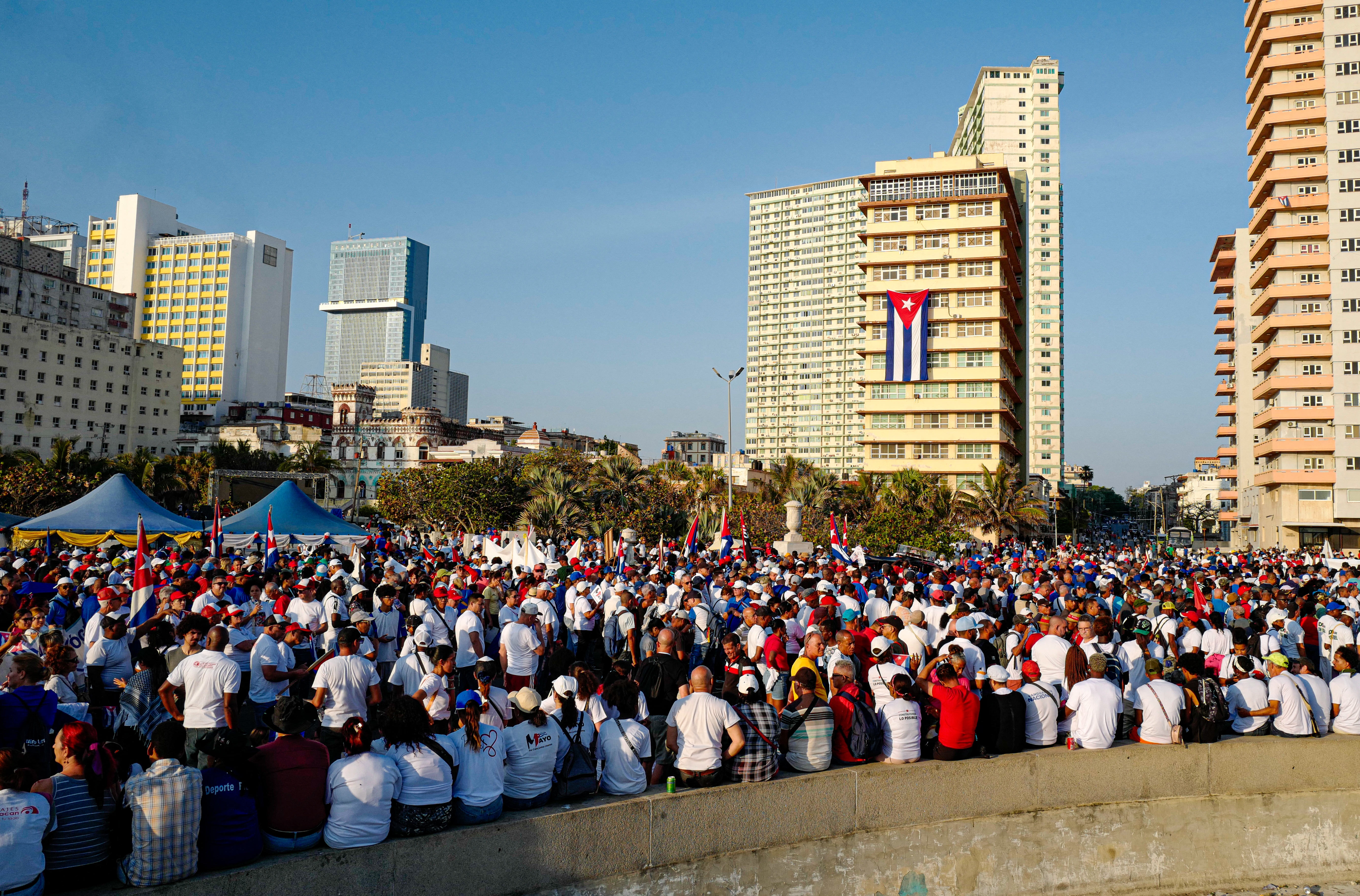 Crowds gather for a protest in front of the US embassy