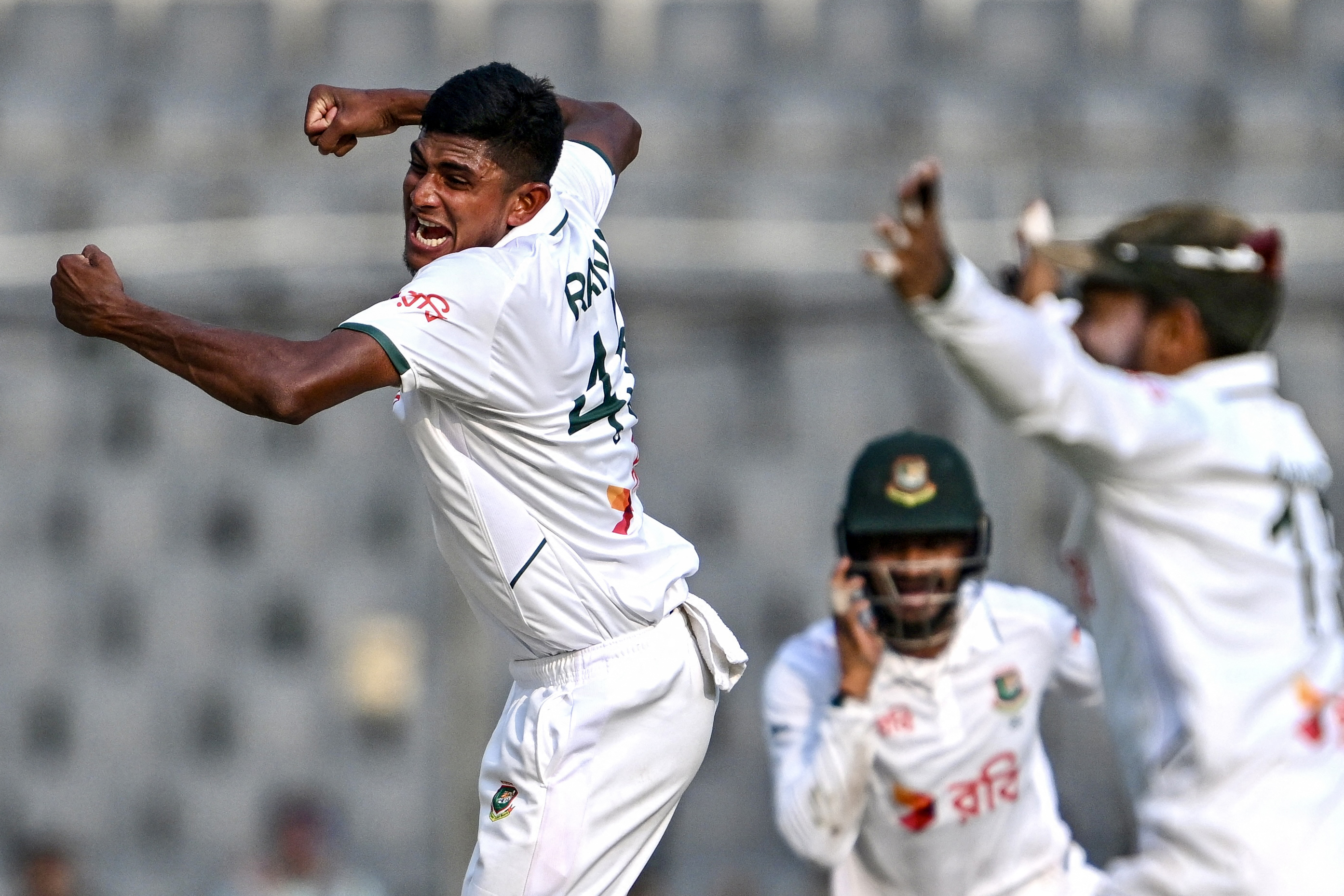 Rana, left, celebrates with his Bangladesh teammates after winning the first Test