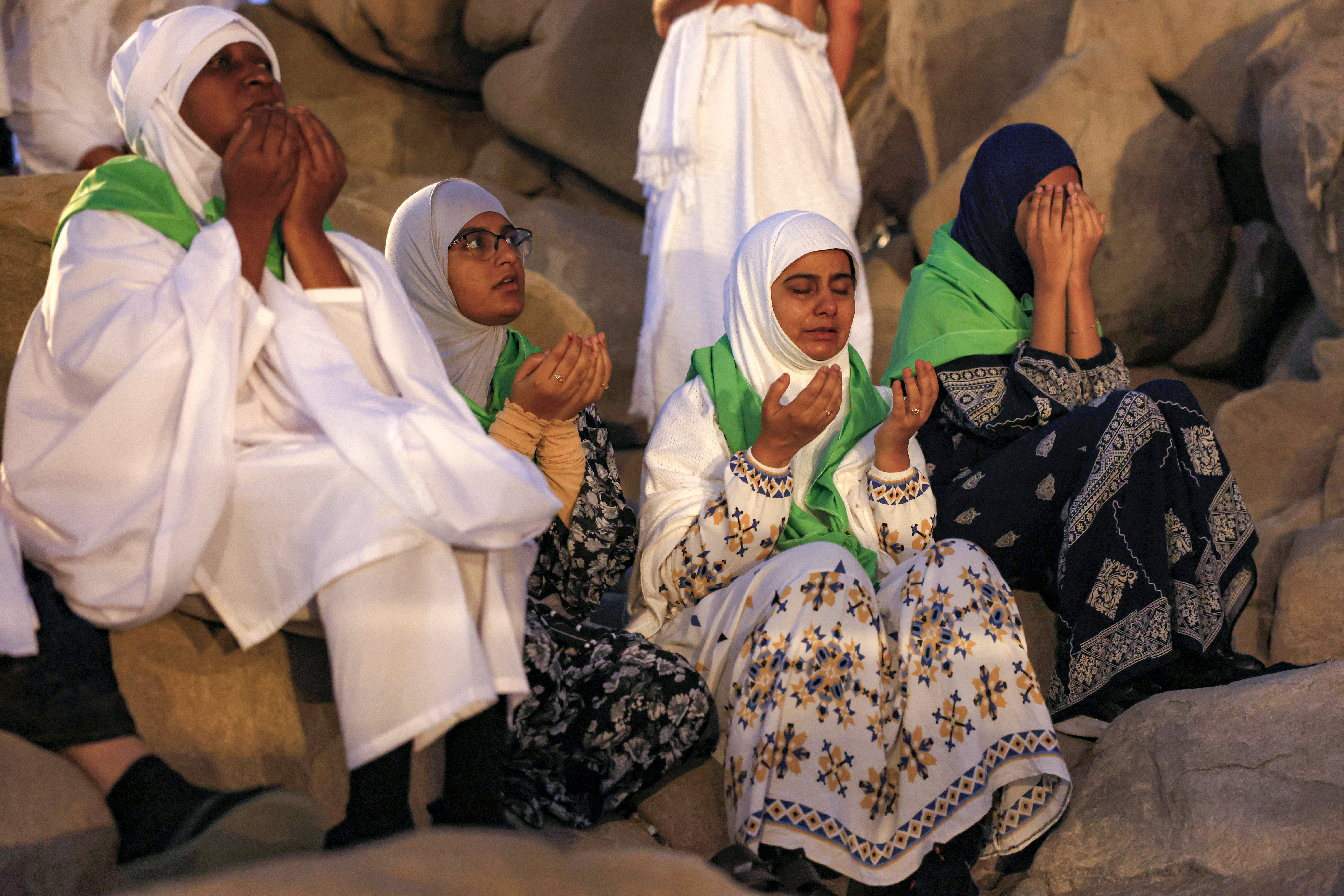 Hajj pilgrims gather at Mount Arafat under scorching desert sun