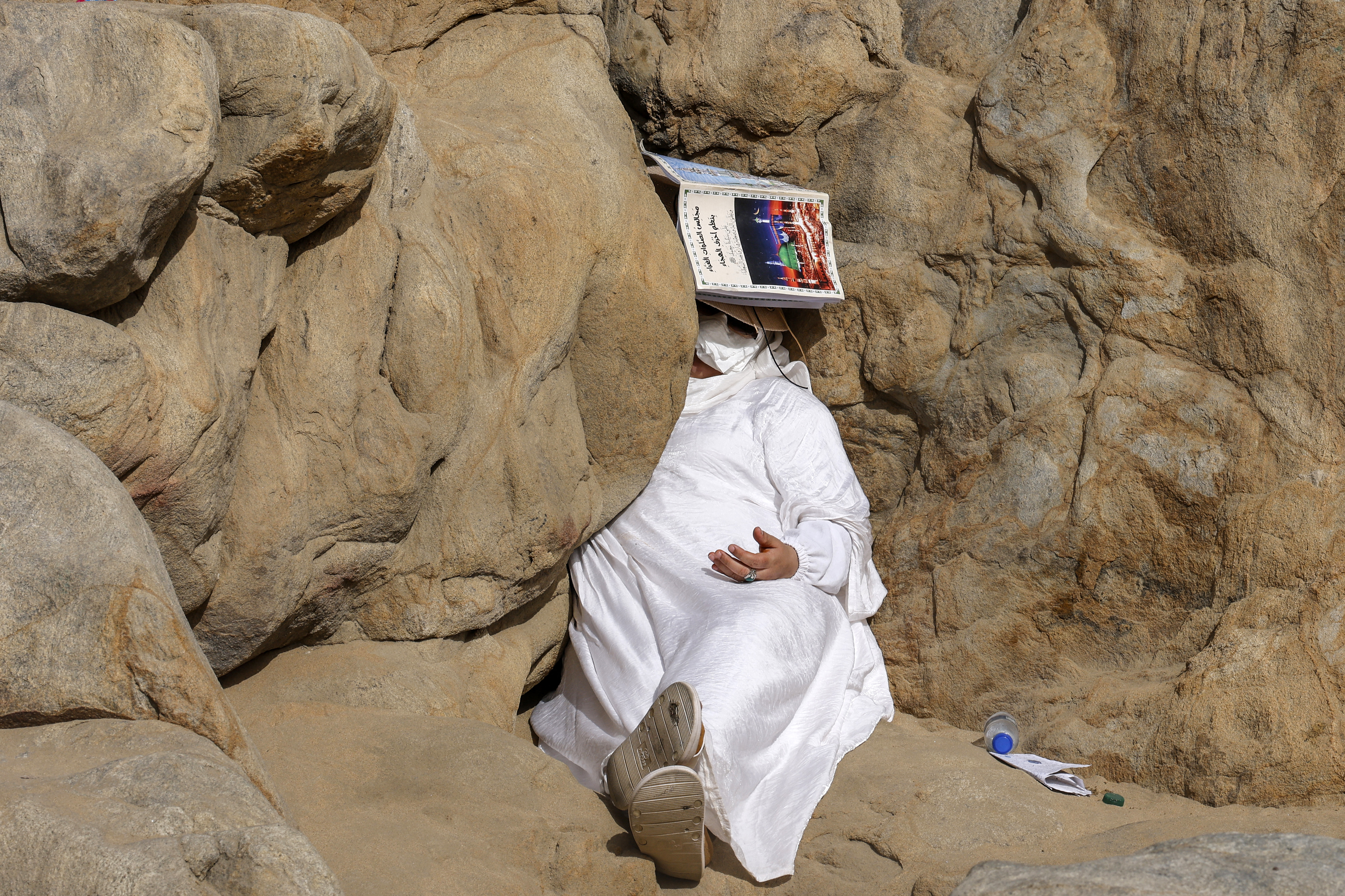 Hajj pilgrims gather at Mount Arafat under scorching desert sun