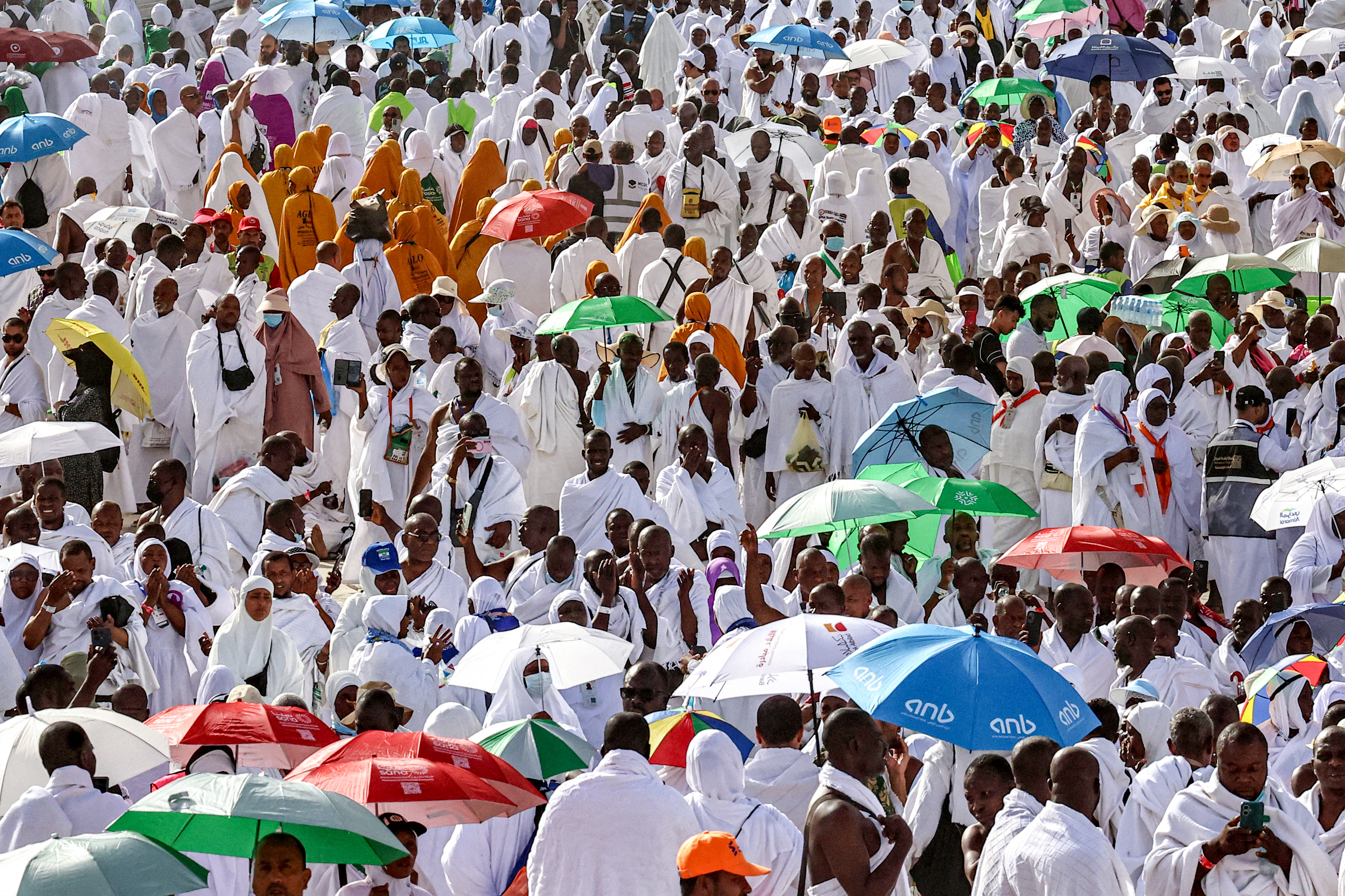 Hajj pilgrims gather at Mount Arafat under scorching desert sun