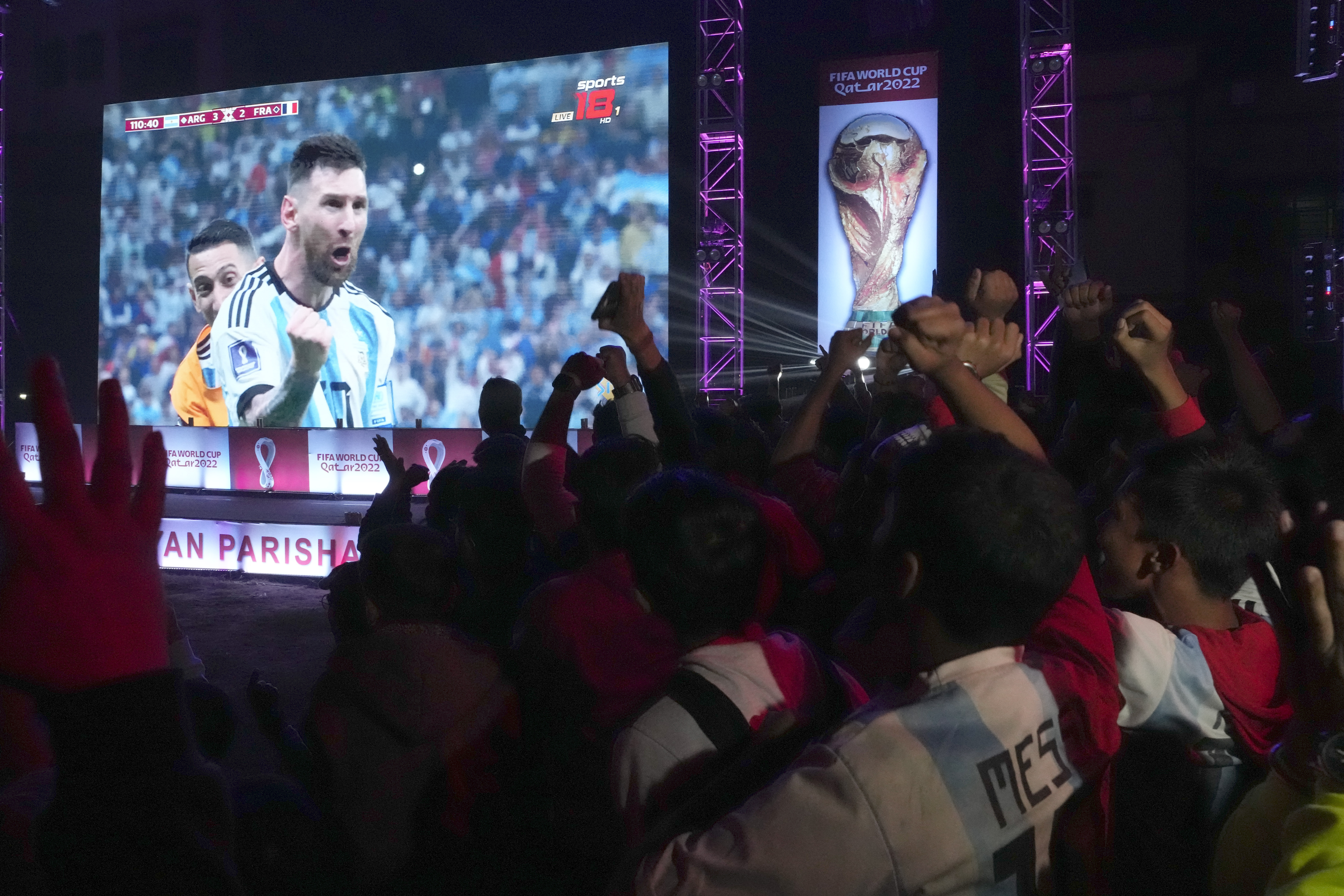 Indian supporters of Argentina celebrate after Argentina won FIFA World Cup final match against France in Qatar, in Kolkata, India, Monday, Dec. 19, 2022. (AP Photo/Bikas Das)