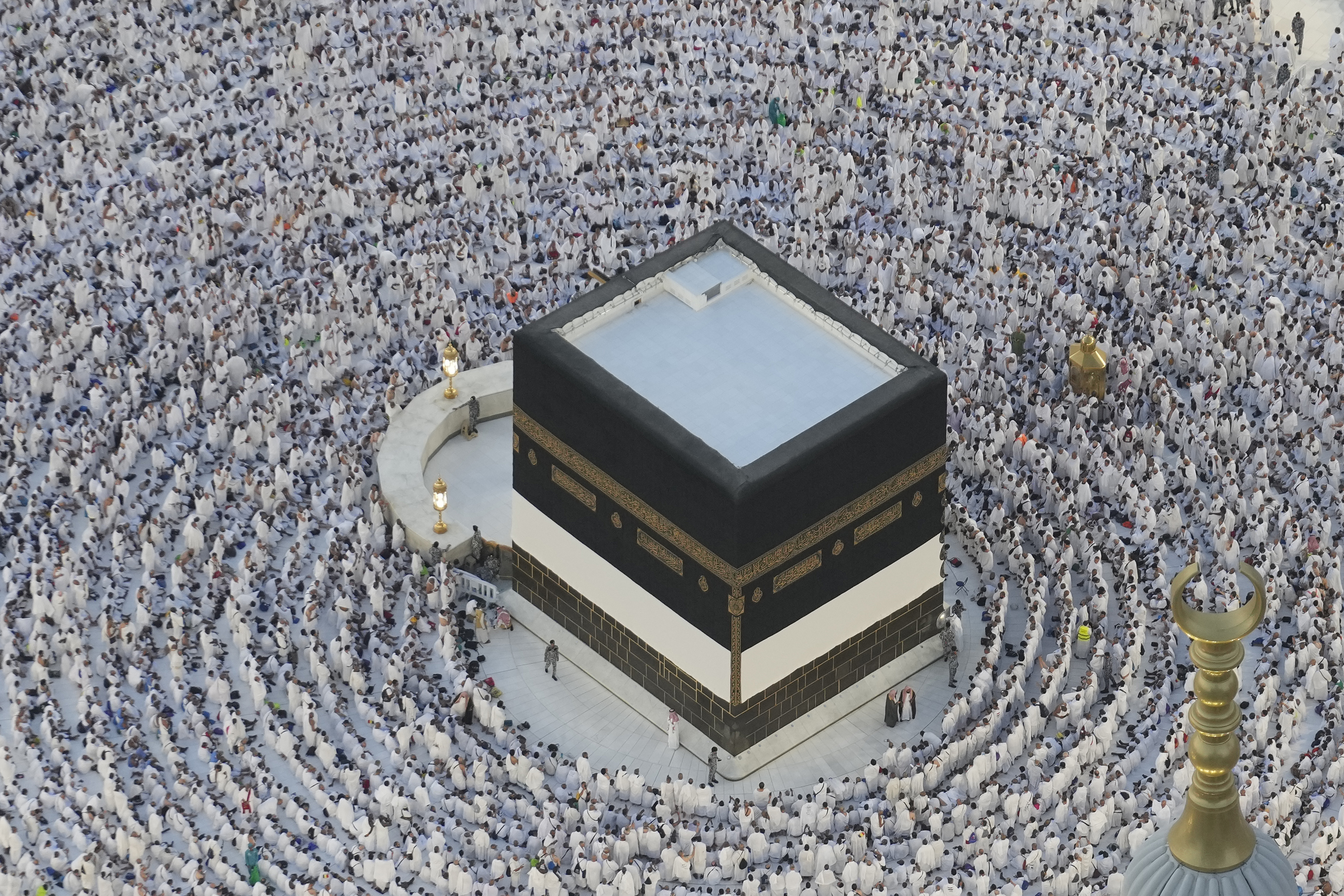 Muslim pilgrims circle the Kaaba, the cubic building at the Grand Mosque, during the annual Hajj pilgrimage in Mecca, Saudi Arabia, on June 11, 2024