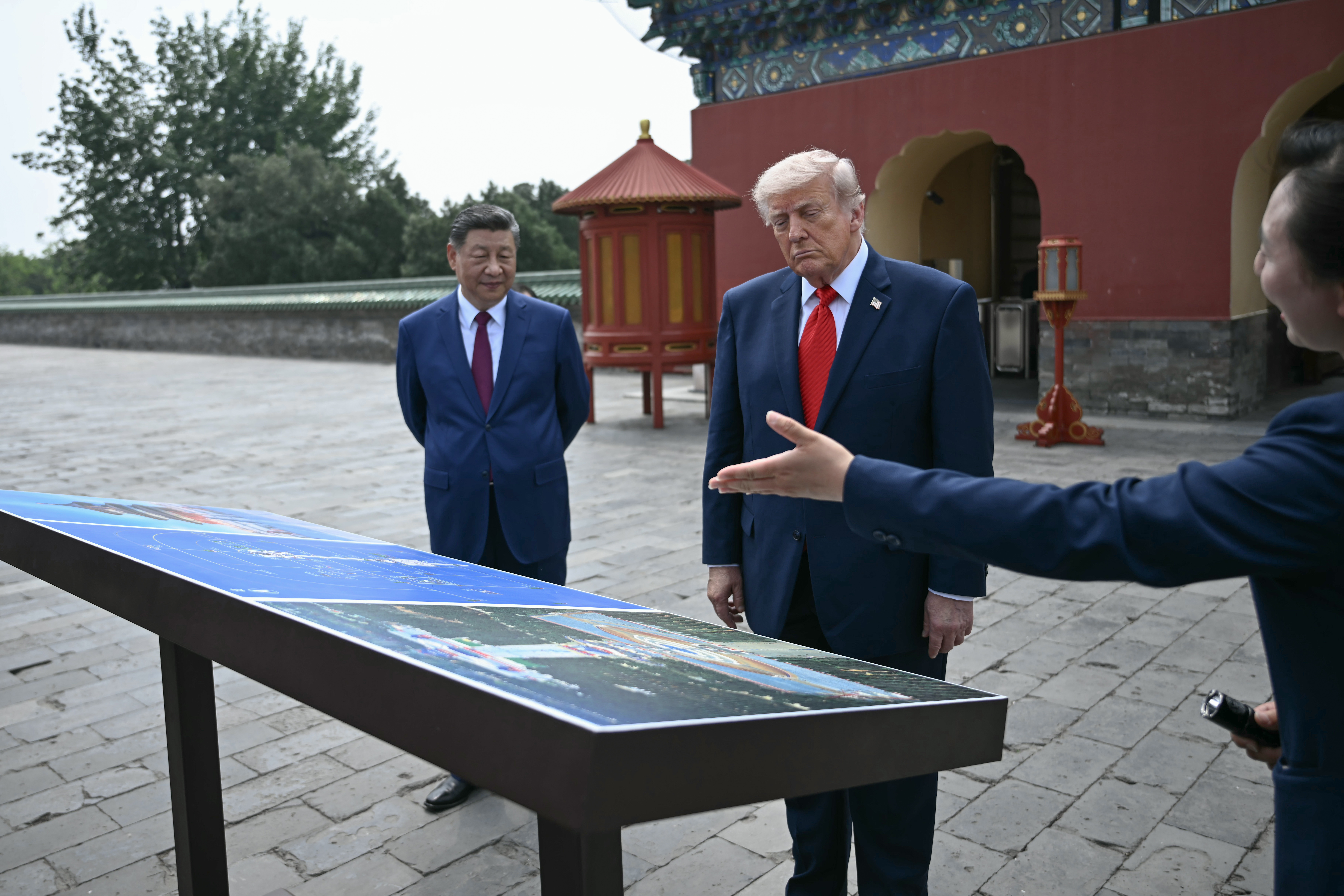 China's President Xi Jinping and U.S. President Donald Trump visit the Temple of Heaven in Beijing Thursday, May 14, 2026. (Brendan Smialowski/Pool Photo via AP)