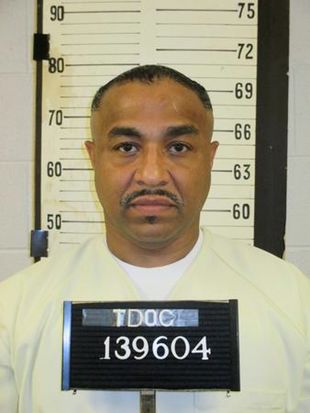 A mugshot of Tony Carruthers