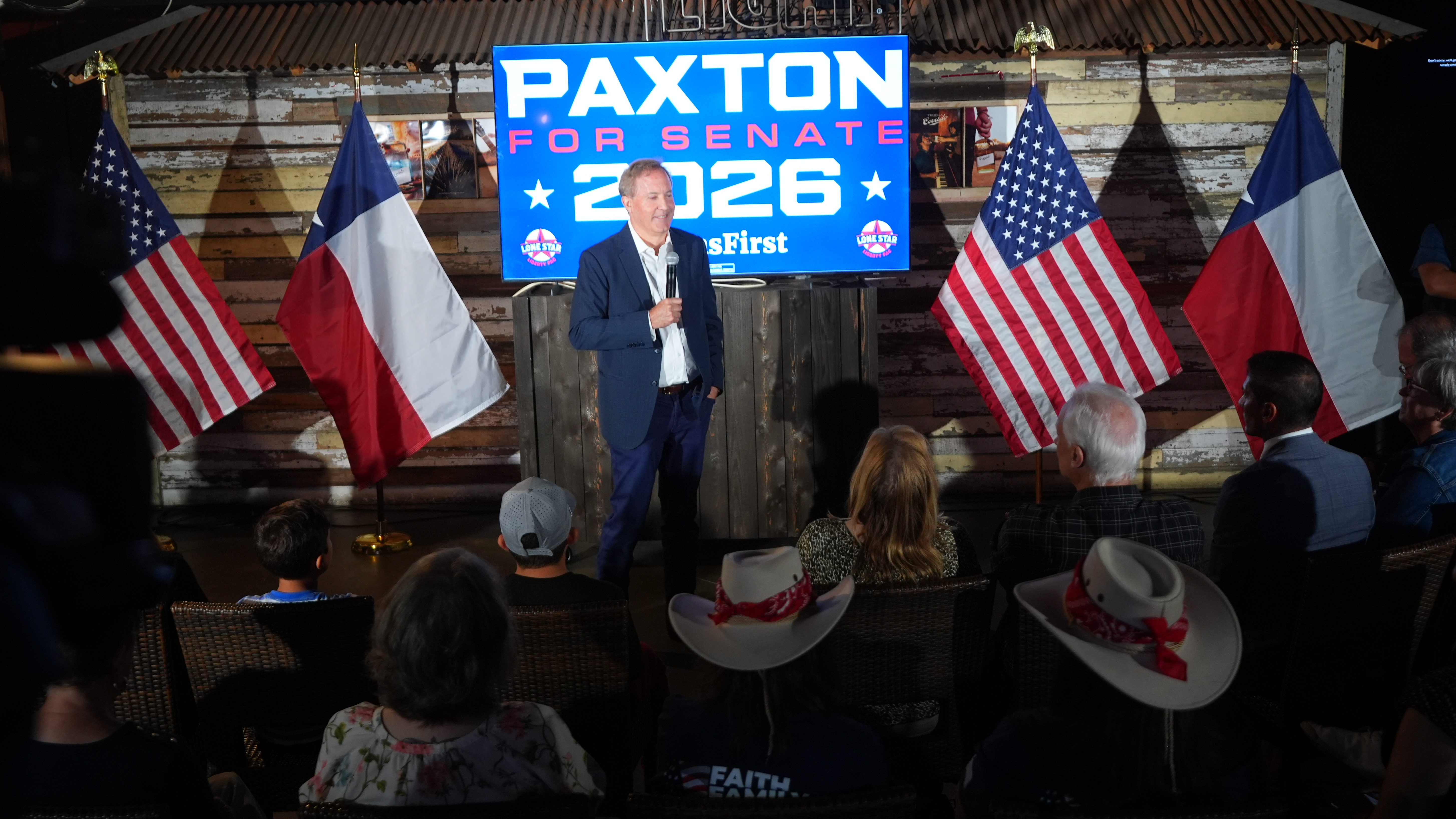 Texas Attorney General Ken Paxton, a Republican candidate for the U.S. Senate, speaks to supporters at a campaign event in McKinney, Texas,