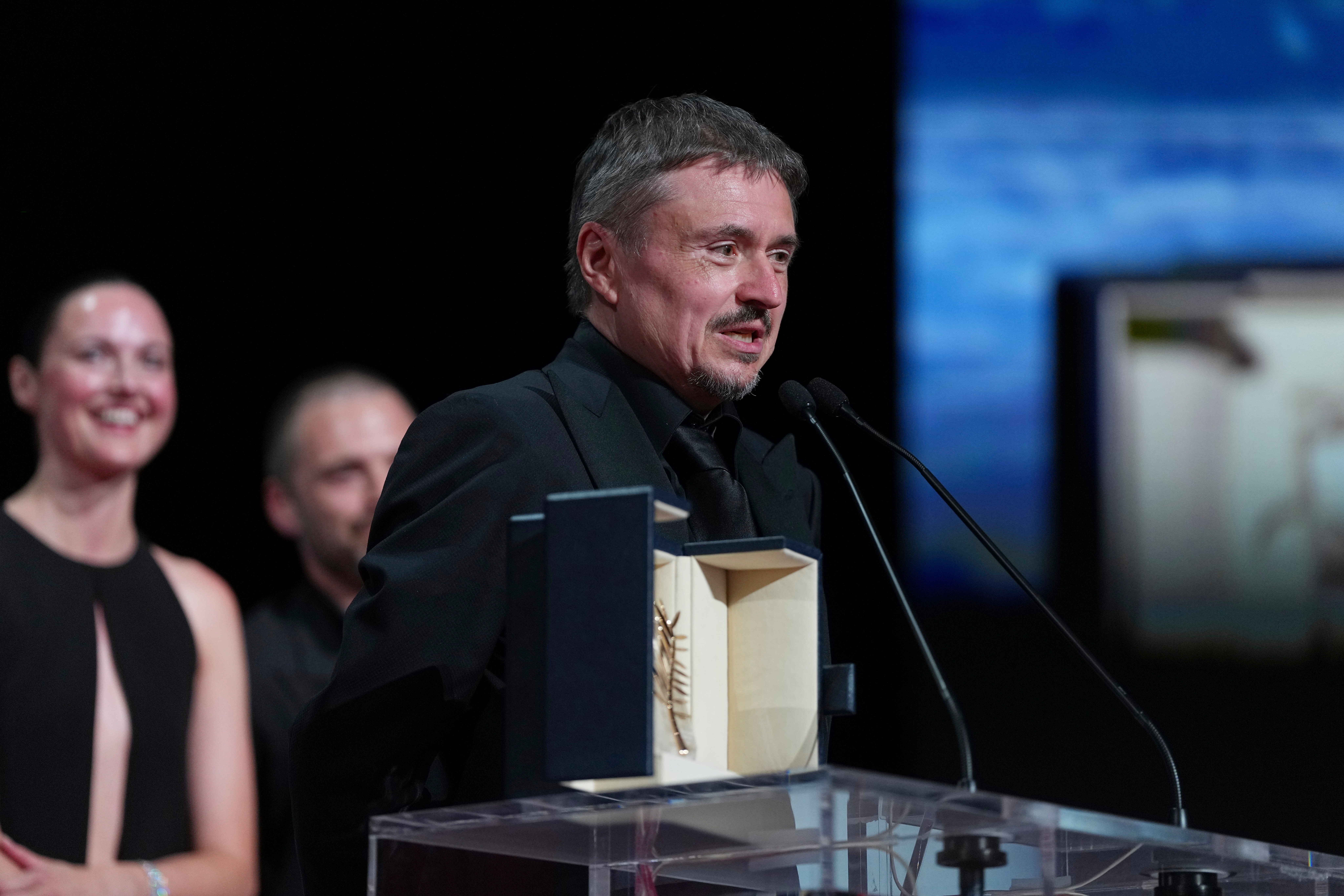 Cristian Mungiu accepts the Palme d'Or for "Fjord" during the awards ceremony of the 79th Cannes Film Festival in southern France on May 23, 2026.