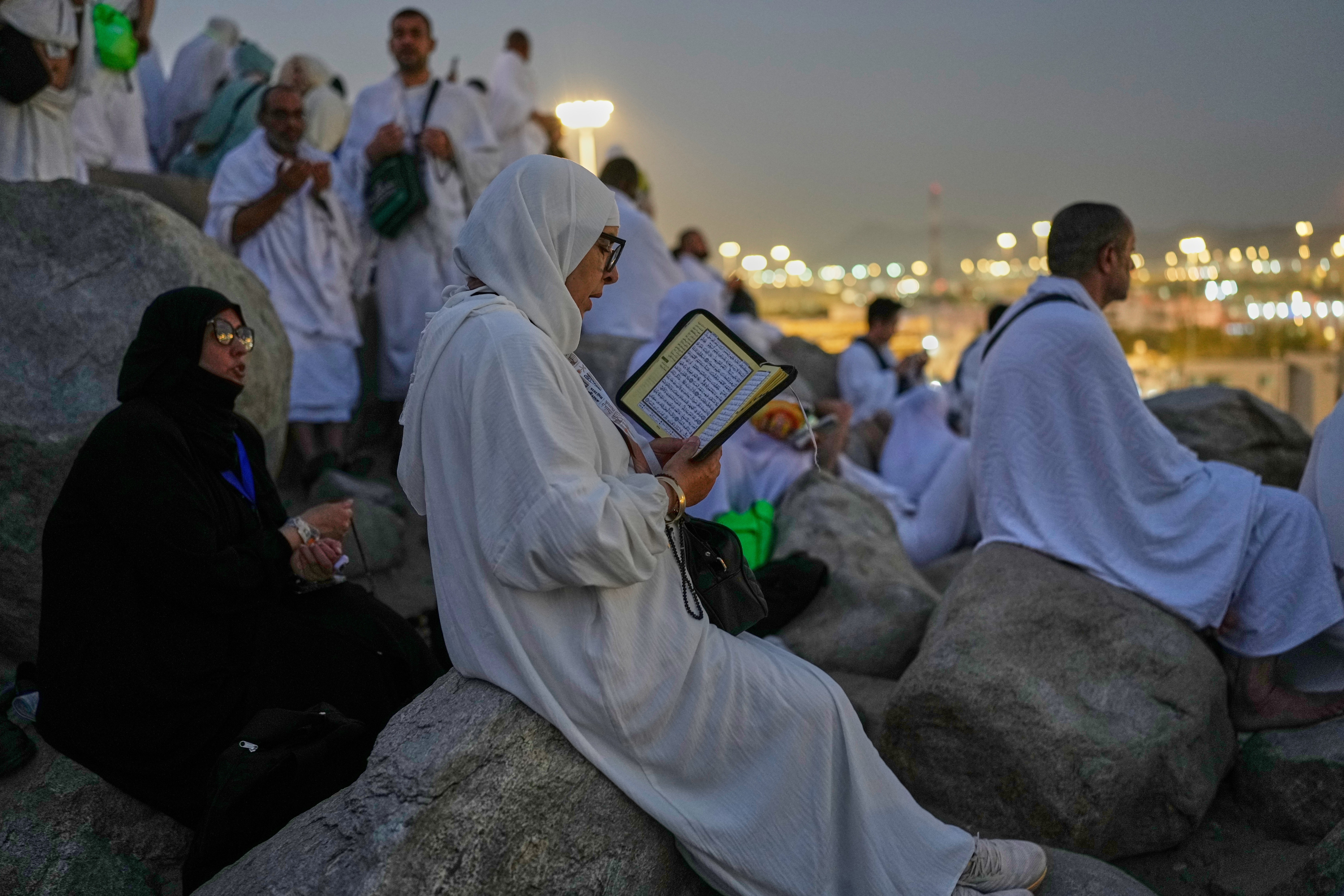 Hajj pilgrims gather at Mount Arafat under scorching desert sun