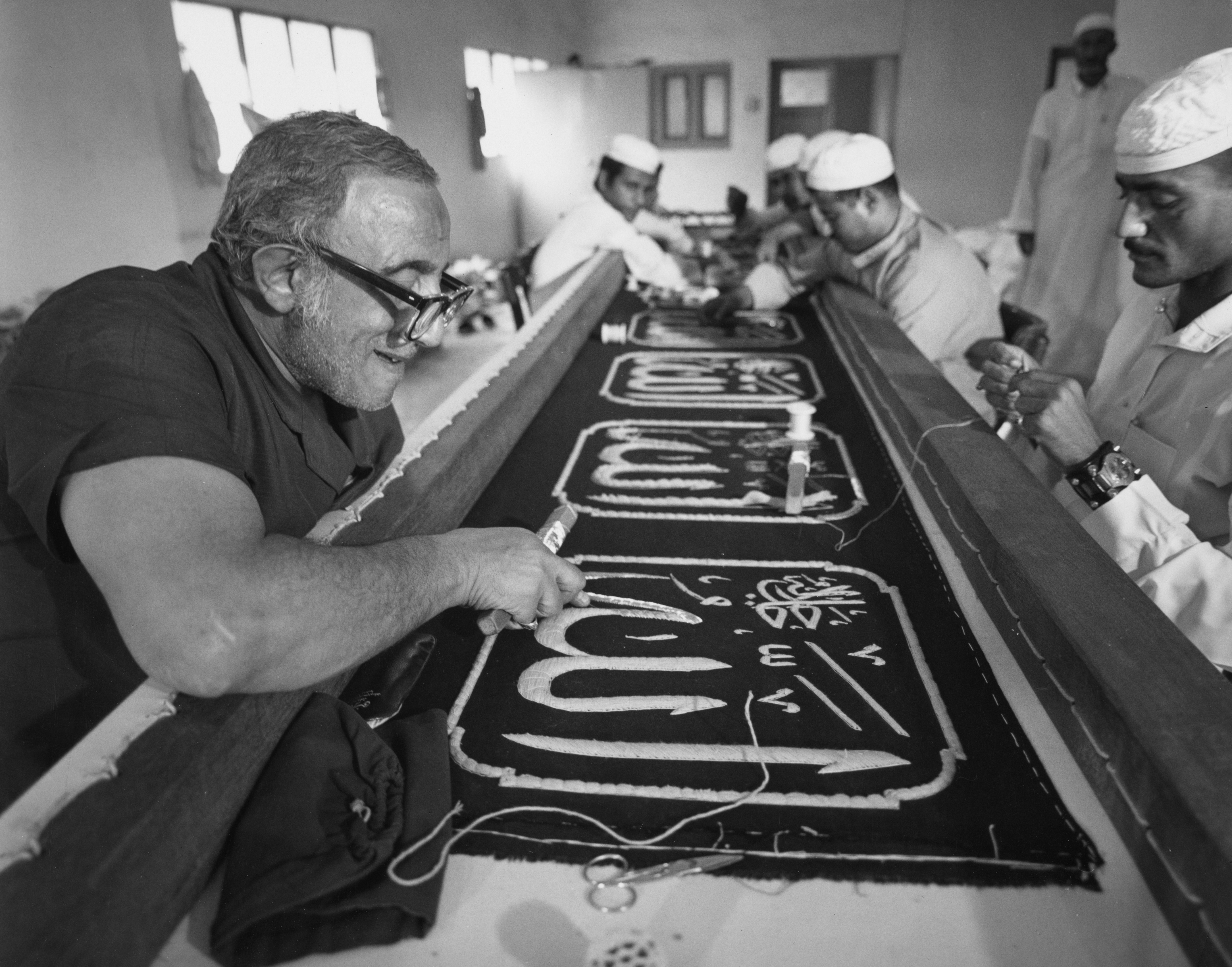 Craftsman hand-embroidering the Kiswa at a Government facility in Mecca, Mecca Province, Saudi Arabia, 1976. The kiswa is the cloth that covers the Kaaba in Mecca. (Photo by Mohamed Amin/Camerapix/Keystone/Hulton Archive/Getty Images)