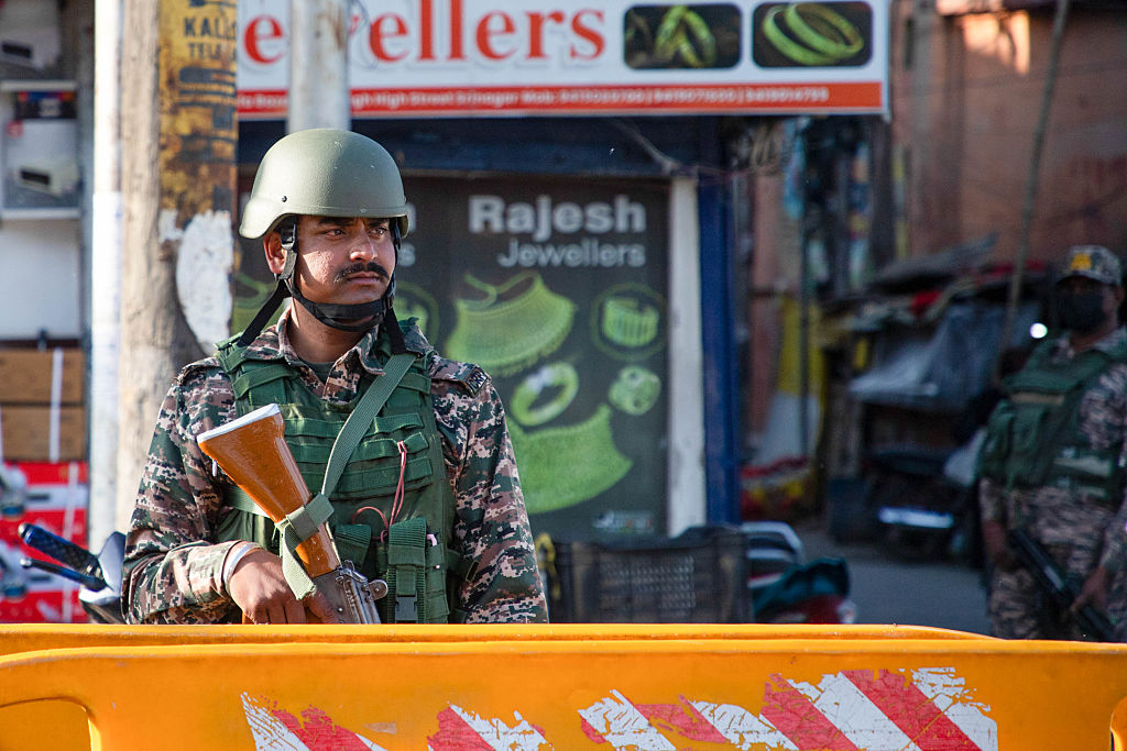 SRINAGAR, JAAMUU AND KASHMIR, INDIA - 2026/05/06: Indian paramilitary soldier stands alert along a street in Srinagar, the summer capital of Jammu and Kashmir. Security forces are on alert across parts of Indian-administered Kashmir to mark the the one year anniversary of the May 7 escalation that followed a deadly militant attack in Pahalgam, where gunmen killed 26 civilians, mostly tourists, on April 22, 2025. The assault was one of the deadliest attack against civilians, it triggered heightened tensions between nuclear-armed rivals India and Pakistan, culminating in cross-border strikes by India after it launched Operation Sindoor targeting alleged militant infrastructure, followed by retaliatory firing and heightened military alert by Pakistan along the Line of Control, before a ceasefire understanding was later reaffirmed by both sides after international diplomatic efforts. Indian authorities say Operation Sindoor remains ongoing. (Photo by Faisal Bashir/SOPA Images/LightRocket via Getty Images)