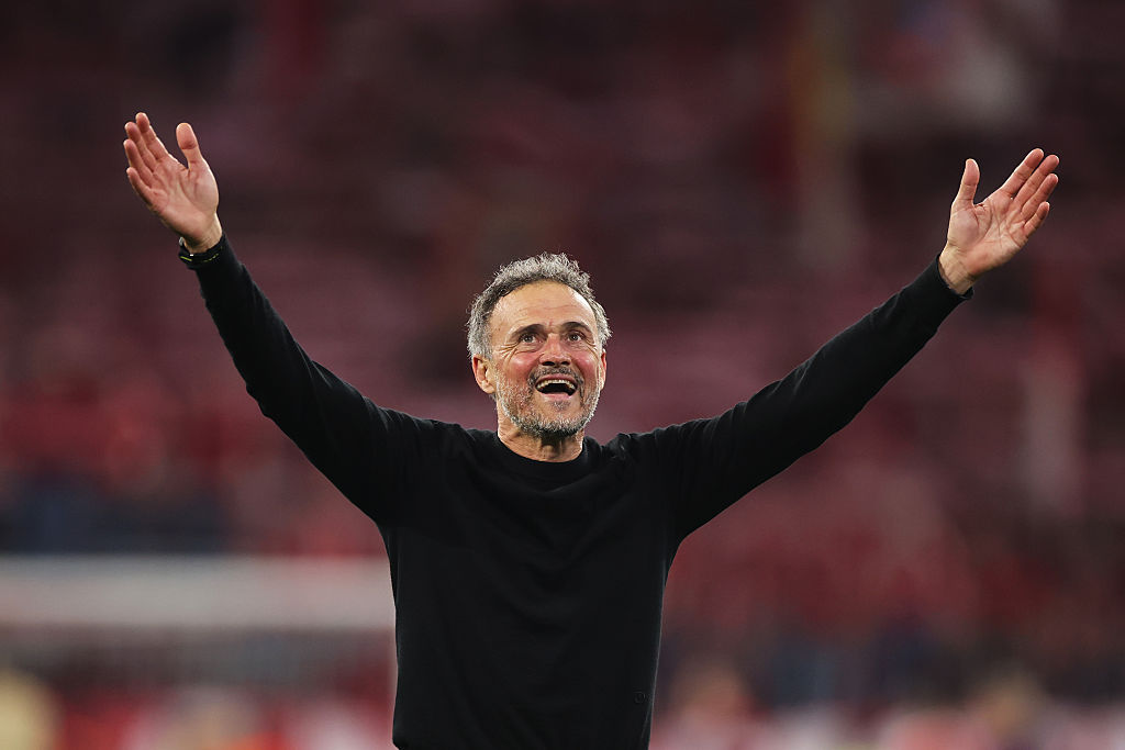 Luis Enrique, Head Coach of Paris Saint-Germain, celebrates following his side's progression to the UEFA Champions League Final