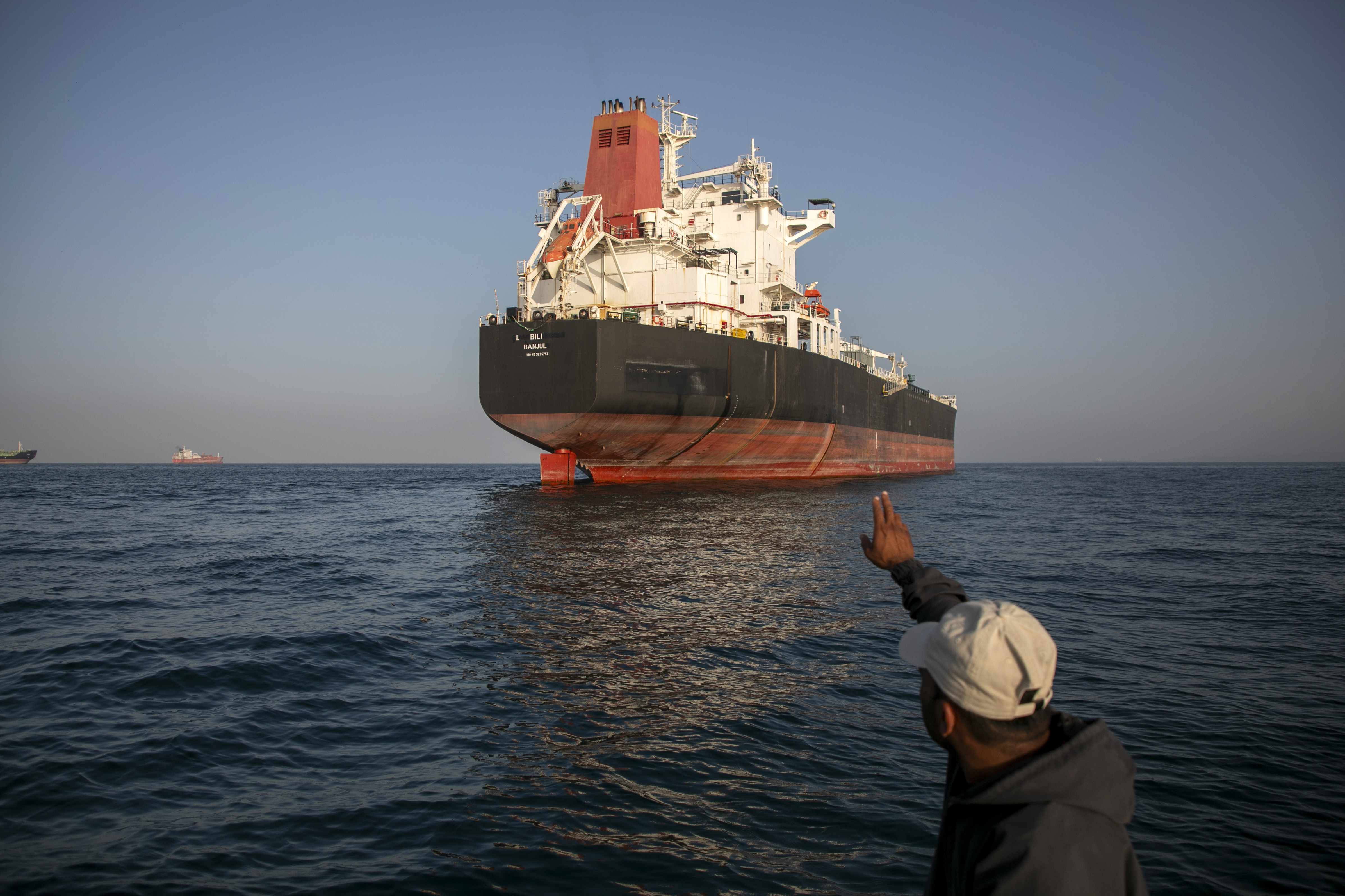 A ship remains anchored on May 16, 2026 in the Strait of Hormuz near Larak Island, Iran.