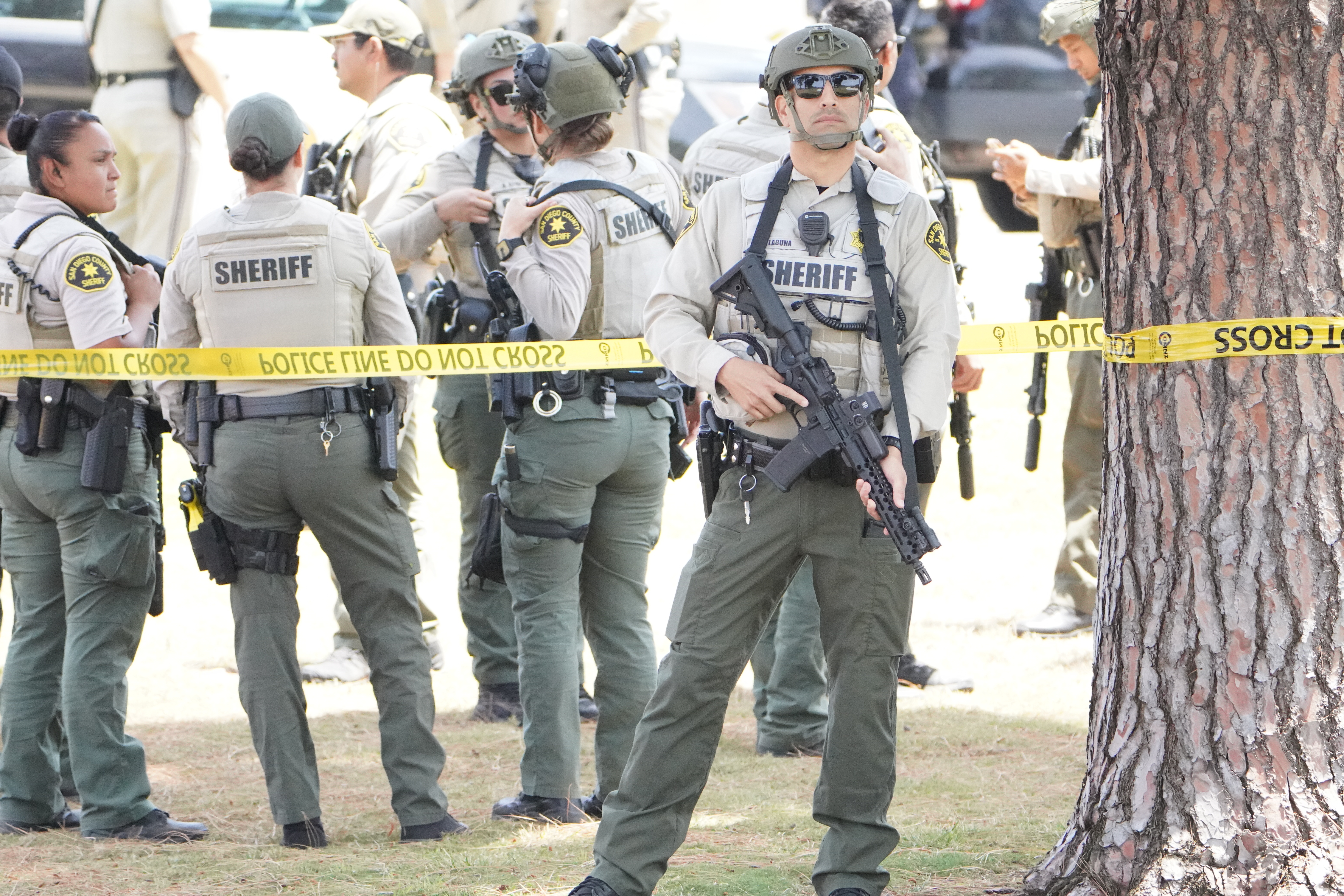 Emergency workers respond at the scene of an active shooter situation at the Islamic Center of San Diego in Southern California, on May 18