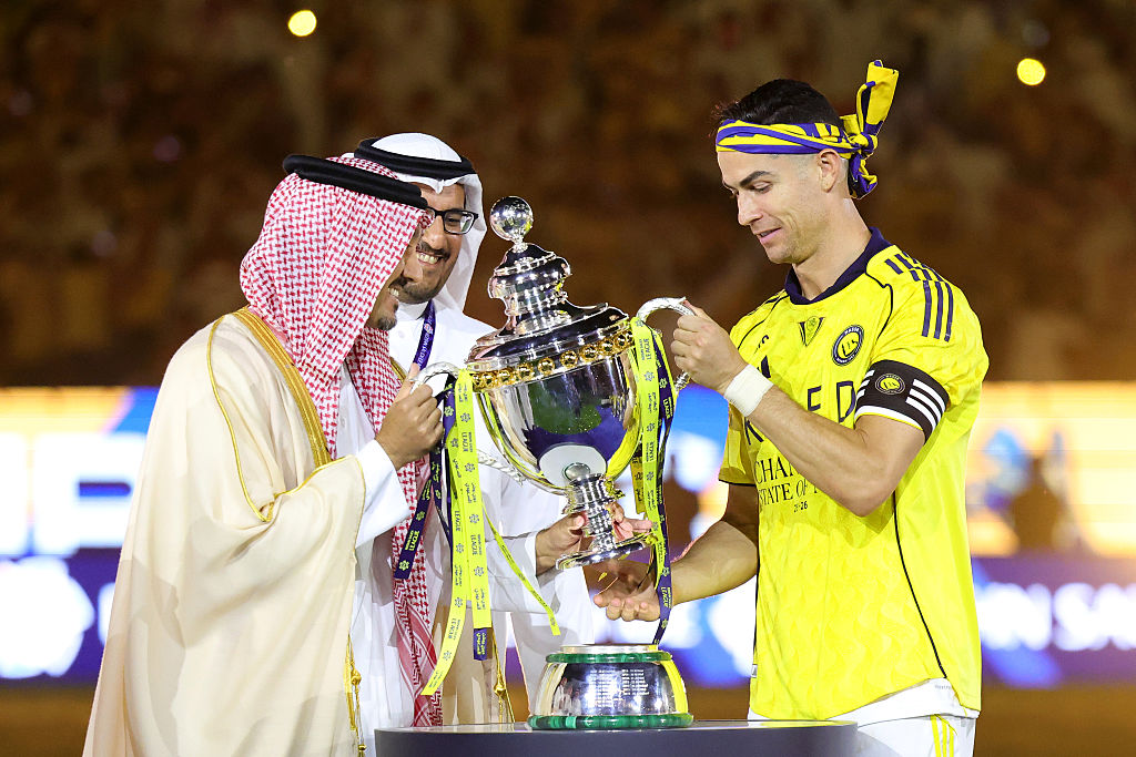 Cristiano Ronaldo of Al Nassr is presented with the Saudi Pro League Trophy [Abdullah Ahmed/Getty Images]