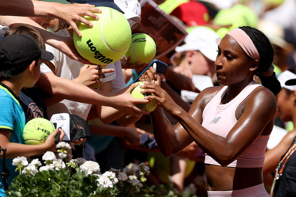 Coco Gauff of the United States signs autographs after training prior to the 2026 French Open at Roland Garros
