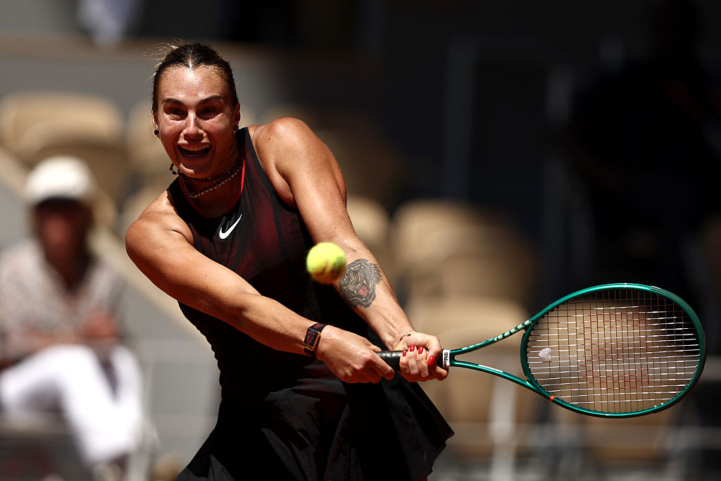 Aryna Sabalenka plays a backhand.