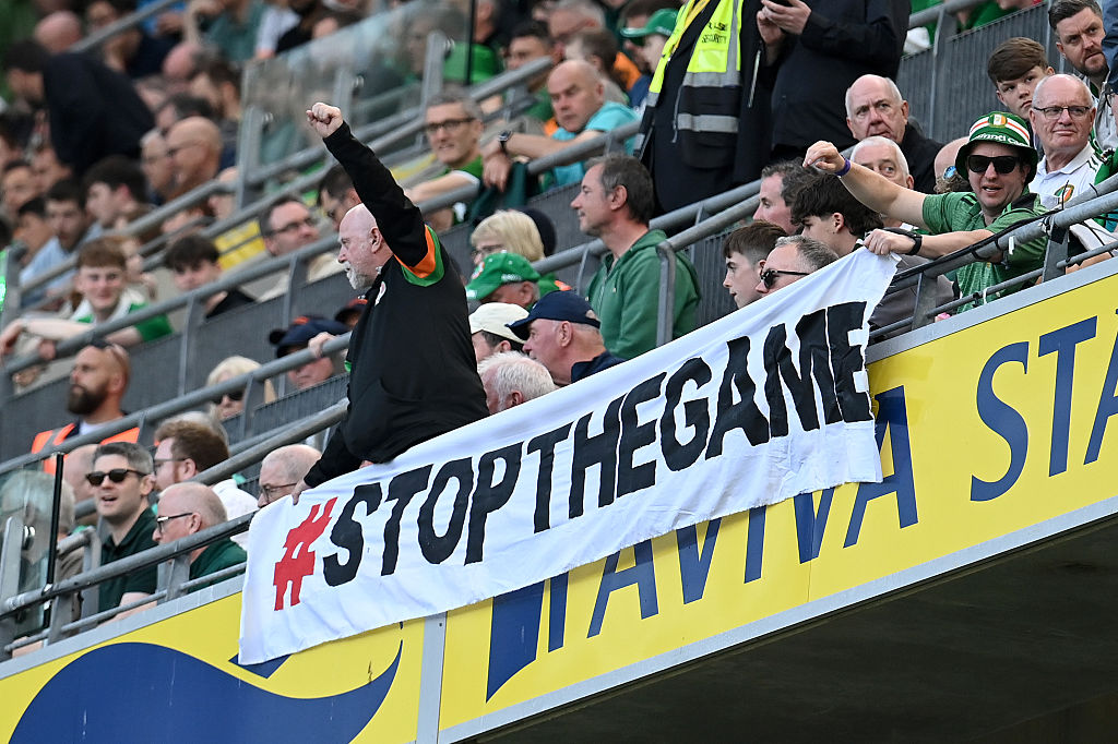 ans protest an upcoming match between Republic of Ireland and Israel during the international friendly match between Republic of Ireland and Qatar at Aviva Stadium