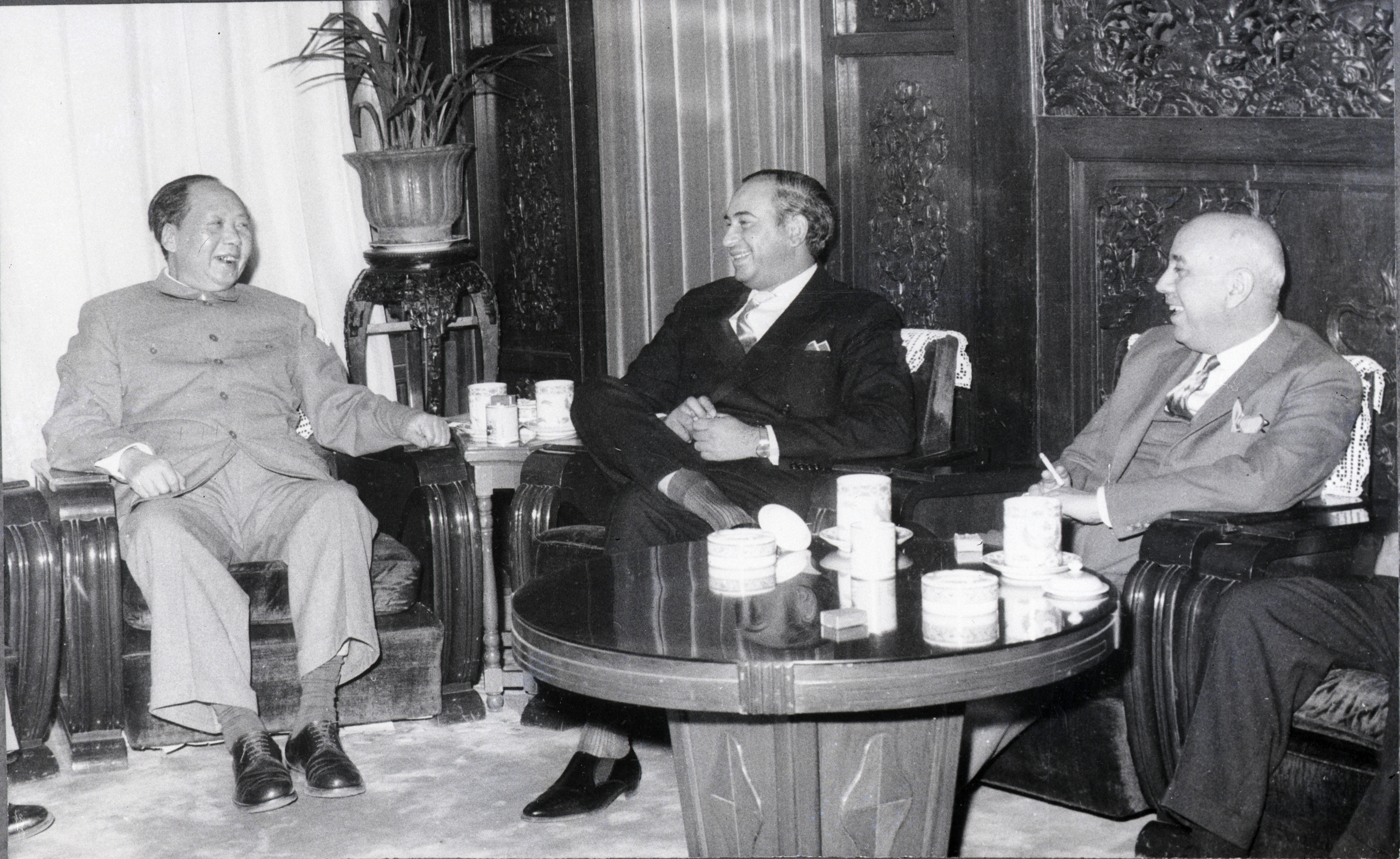 (Original Caption) 3/18/63-Peiping, China: A smiling Mao Tse-Tung (left) plays host as he meets with Pakistan's Minister of External Affairs Zulfigar Ali Bhutto, who led a Pakistani delegation to the Red Chinese capital. Talks centered on the problem of the Red Chinese-Pakistani border. India was reported to be indignant over the Chinese-Pakistani conference at a time when Chinese Communist troops were still holding Indian border territory in the Himalayas.