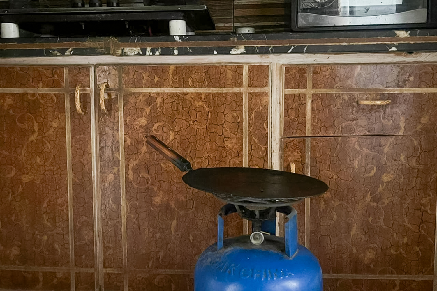 Karachi resident Shabana Hasan keeps a gas cylinder for times when the PNG is not available, or its pressure is too low