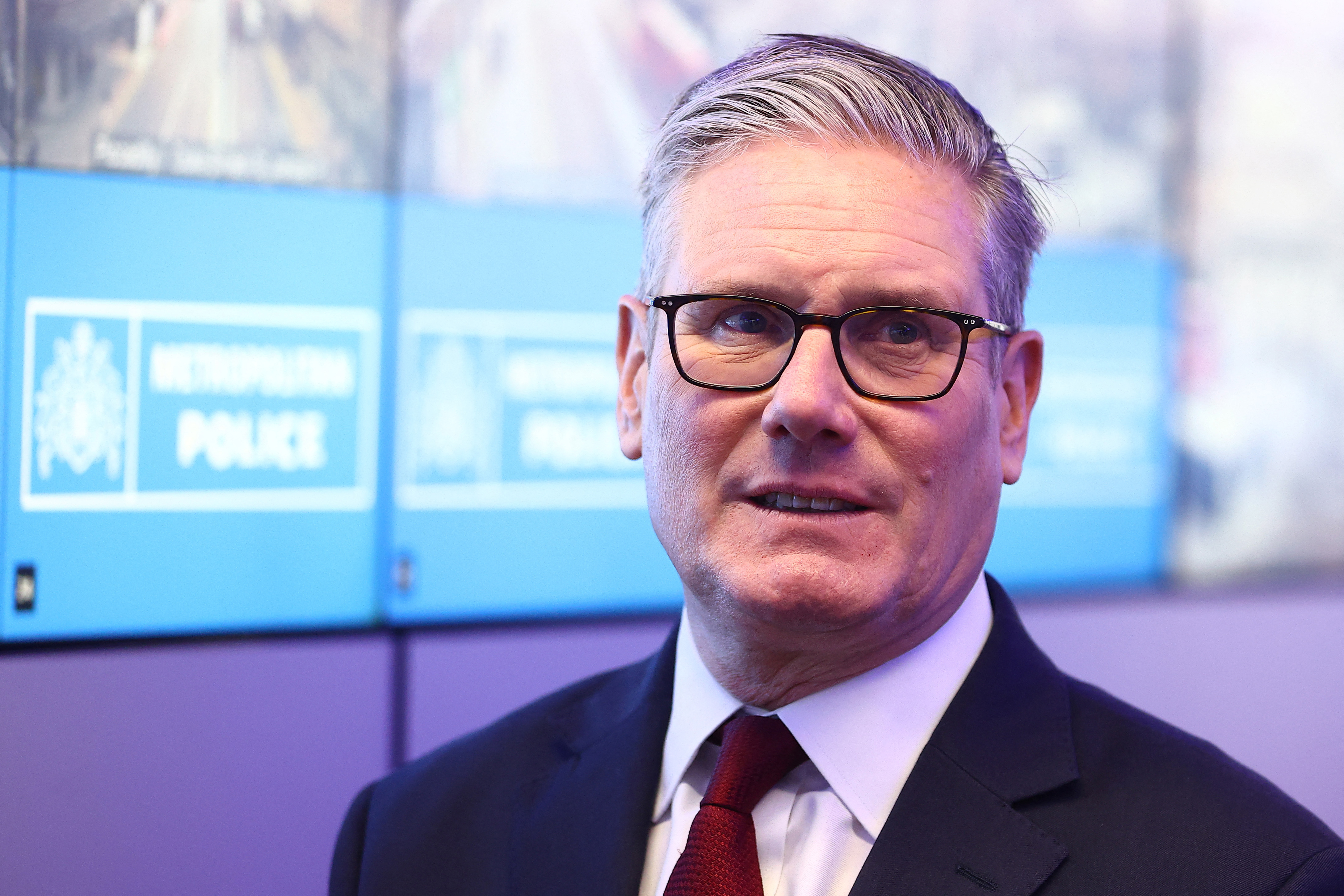 Britain's Prime Minister Keir Starmer reacts as he meets with Metropolitan police officers to discuss operational planning ahead of this weekend's planned protests, in the Lambeth area of London on May 15, 2026. [Peter Nicholls/AFP]