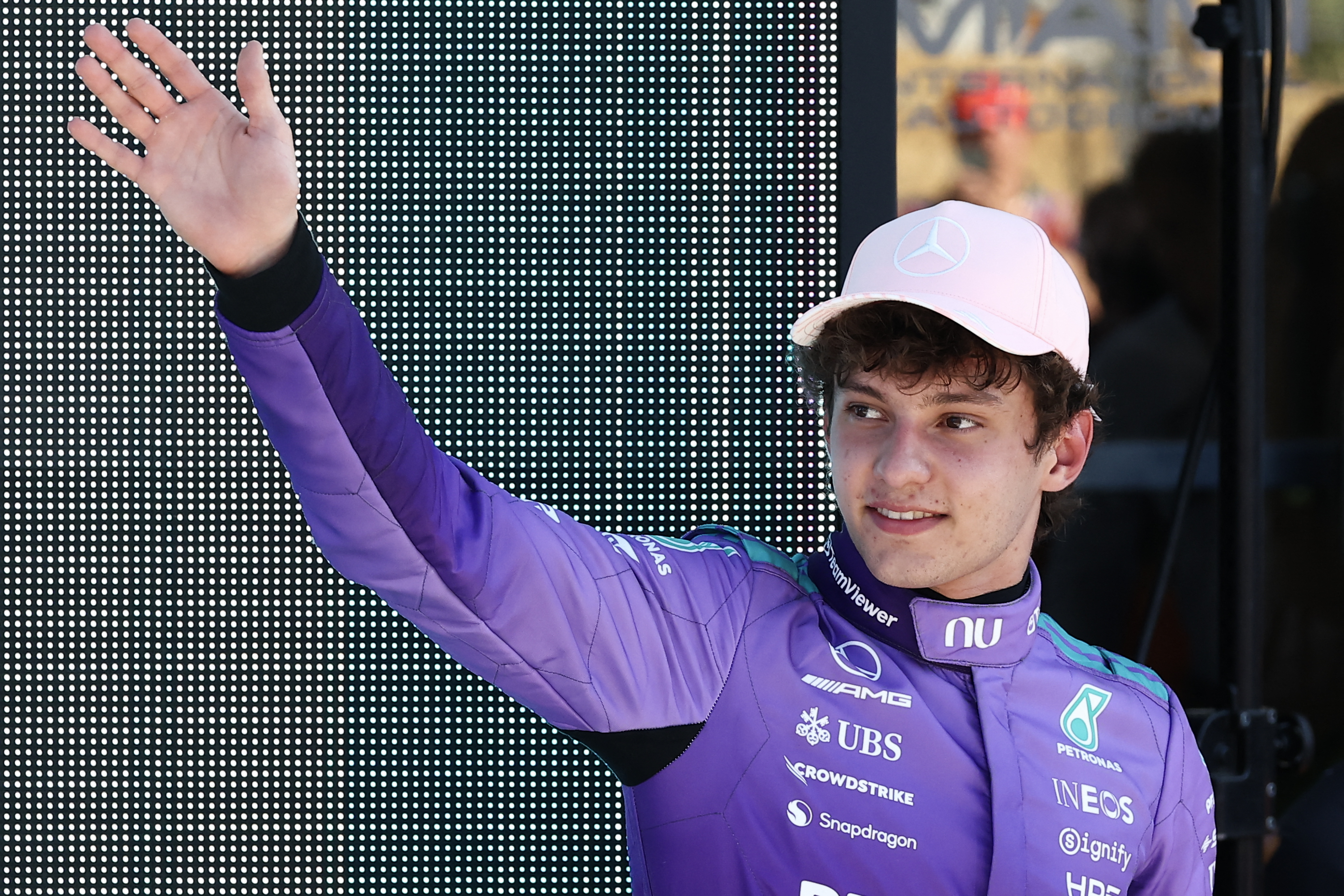 TOPSHOT - Mercedes' Italian driver Kimi Antonelli waves after winning the pole position during the qualifying session for the 2026 Miami Formula One Grand Prix at Miami International Autodrome in Miami Gardens, Florida, on May 2, 2026. (Photo by CHARLY TRIBALLEAU / AFP)