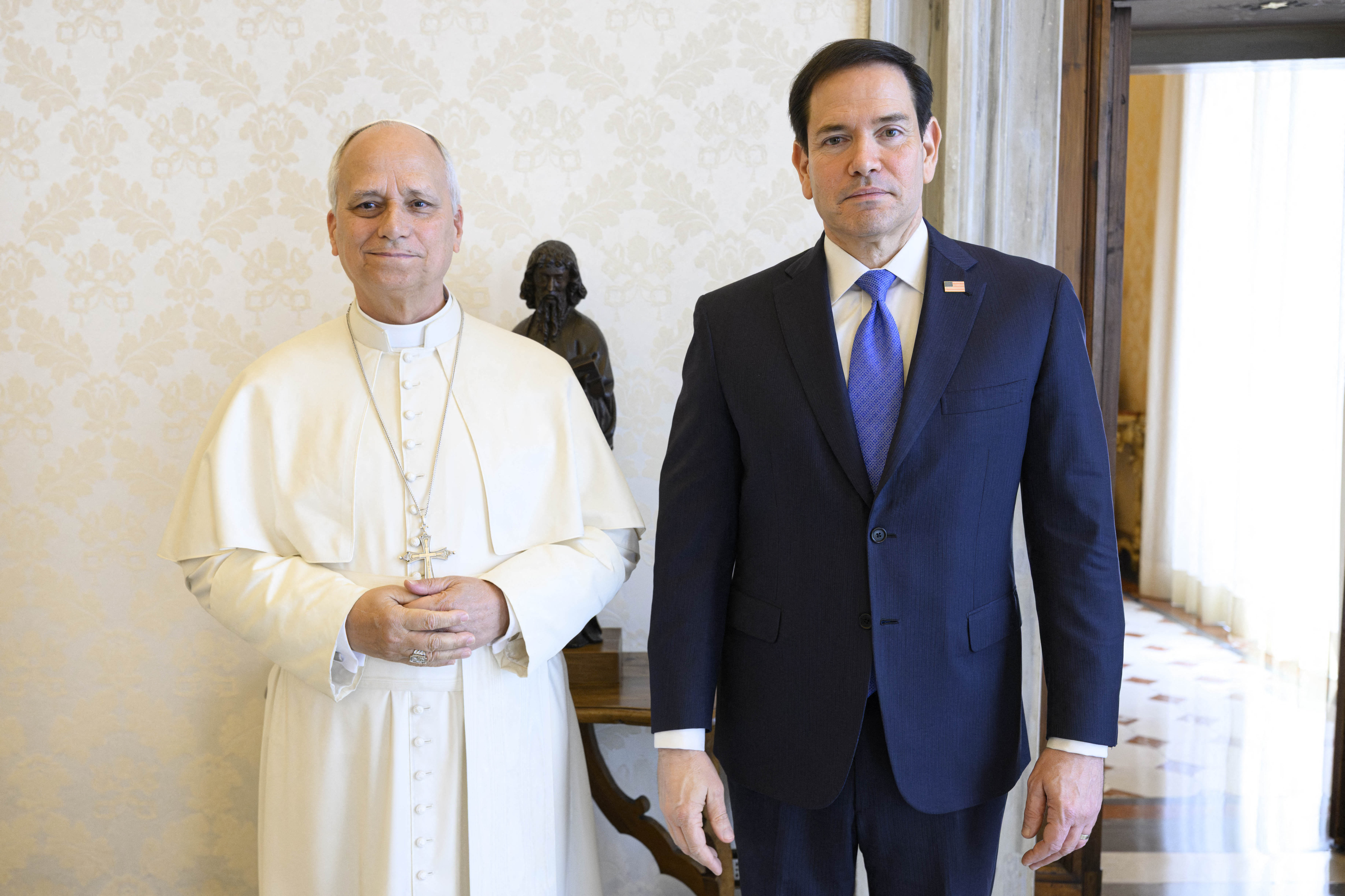 This photo taken and handout on May 7, 2026 by The Vatican Media shows Pope Leo XIV during a private audience with U.S. Secretary of State Marco Rubio in The Vatican. (Photo by Handout / VATICAN MEDIA / AFP) / RESTRICTED TO EDITORIAL USE - MANDATORY CREDIT "AFP PHOTO / VATICAN MEDIA" - NO MARKETING - NO ADVERTISING CAMPAIGNS - DISTRIBUTED AS A SERVICE TO CLIENTS