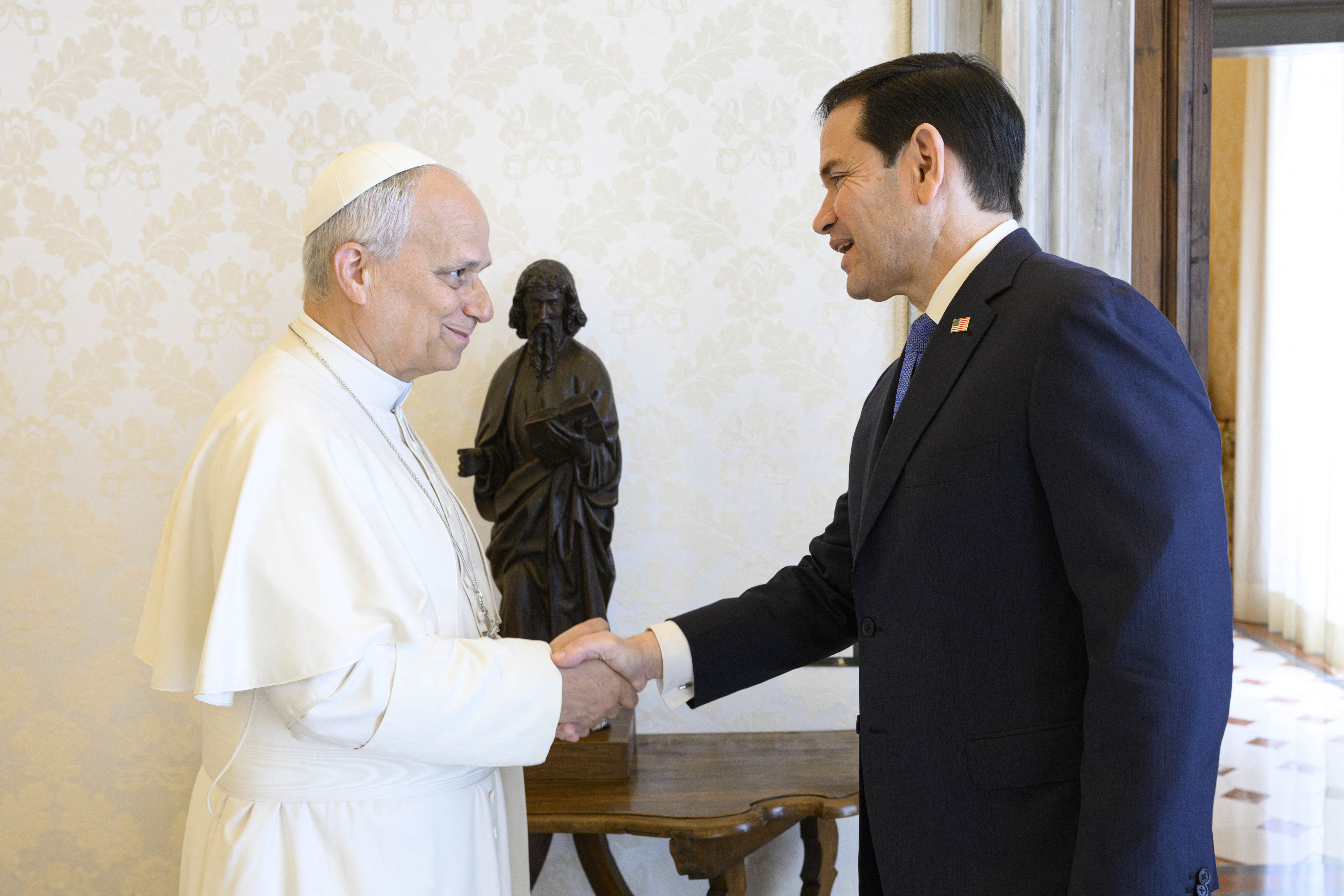 This photo taken and handout on May 7, 2026 by The Vatican Media shows Pope Leo XIV during a private audience with U.S. Secretary of State Marco Rubio in The Vatican. (Photo by Handout / VATICAN MEDIA / AFP) / RESTRICTED TO EDITORIAL USE - MANDATORY CREDIT "AFP PHOTO / VATICAN MEDIA" - NO MARKETING - NO ADVERTISING CAMPAIGNS - DISTRIBUTED AS A SERVICE TO CLIENTS