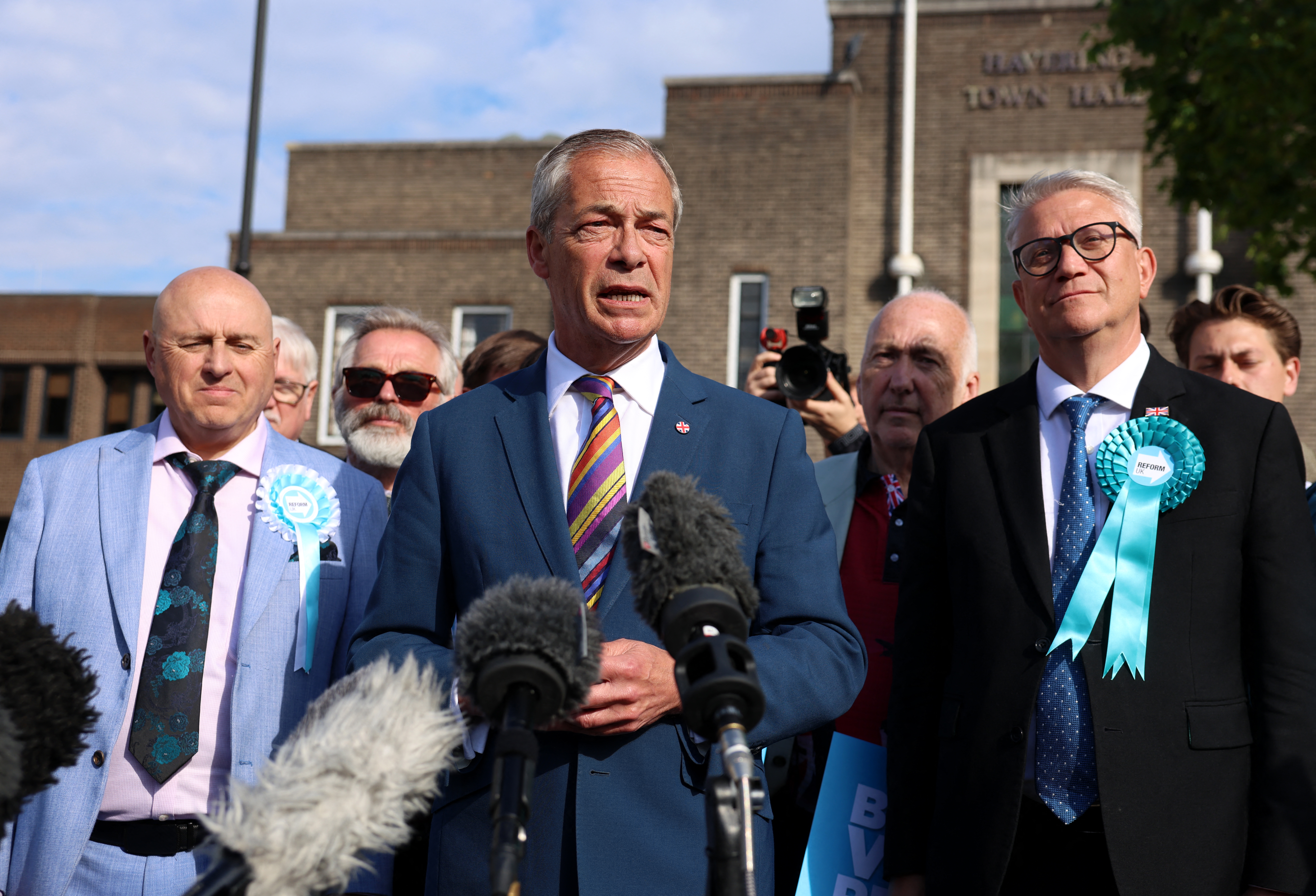 Reform UK leader Nigel Farage speaks outside the Havering Town Hall a day after local elections in east London on May 8, 2026.