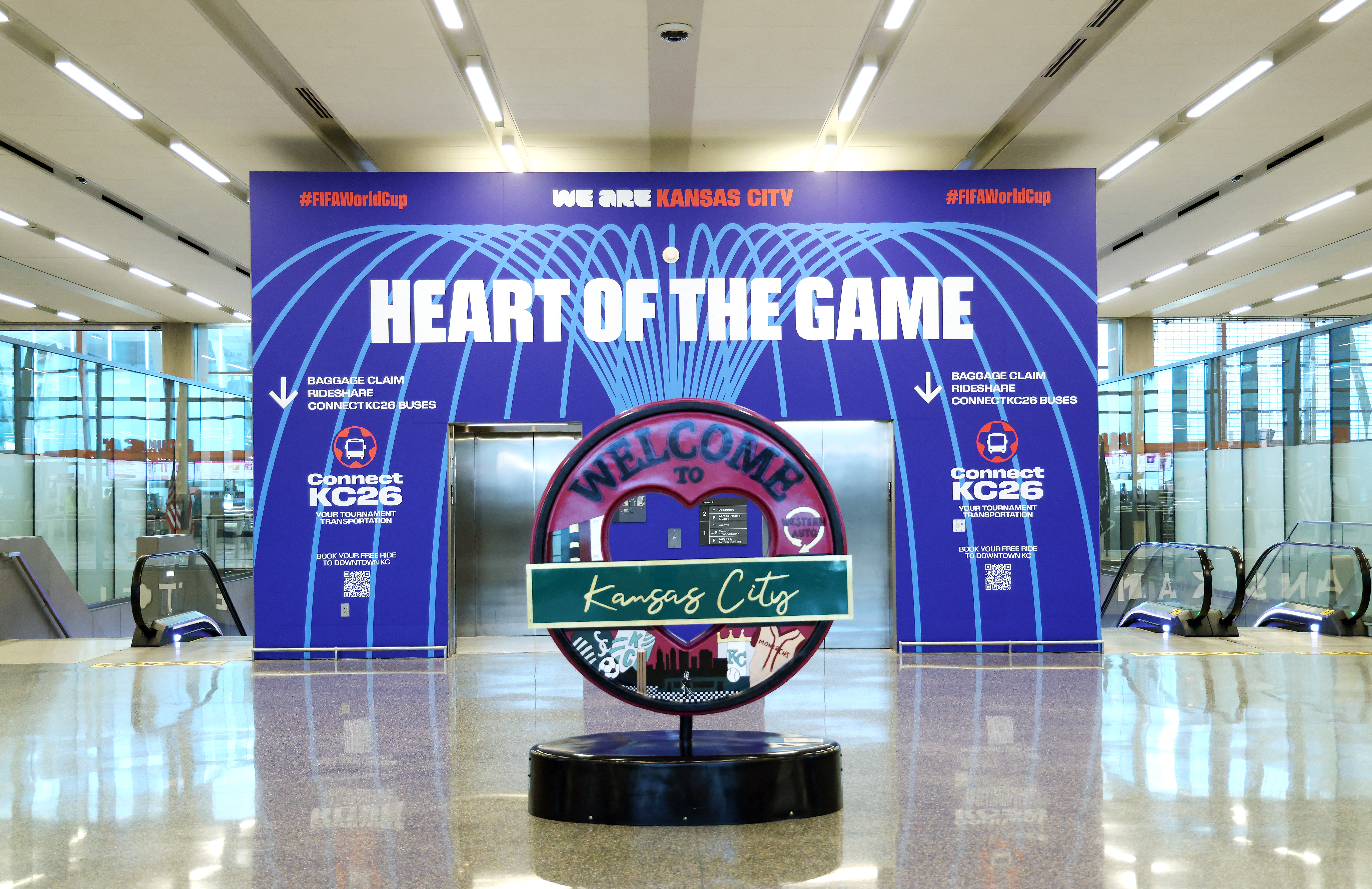 KANSAS CITY, MISSOURI - MAY 05: World Cup signage is displayed at the Kansas City airport ahead of the 2026 World Cup on May 05, 2026 in Kansas City, Missouri. Jamie Squire/Getty Images/AFP (Photo by JAMIE SQUIRE / GETTY IMAGES NORTH AMERICA / Getty Images via AFP)
