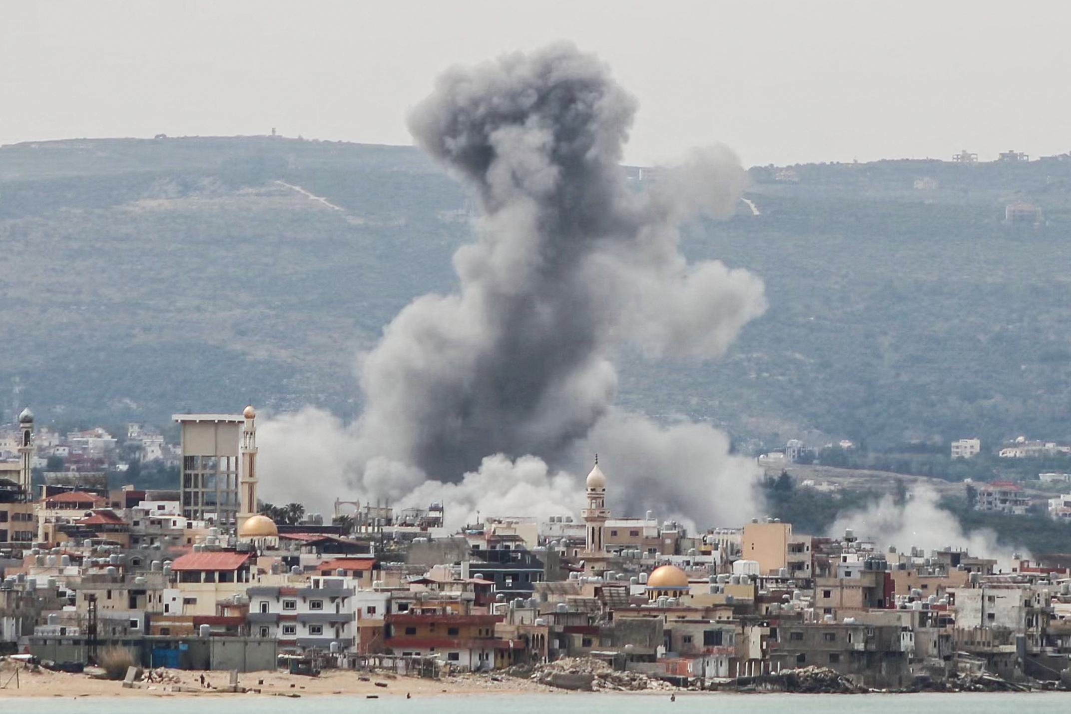 Smoke rises from the site of an Israeli air attack on Ras al-Ain, Lebanon
